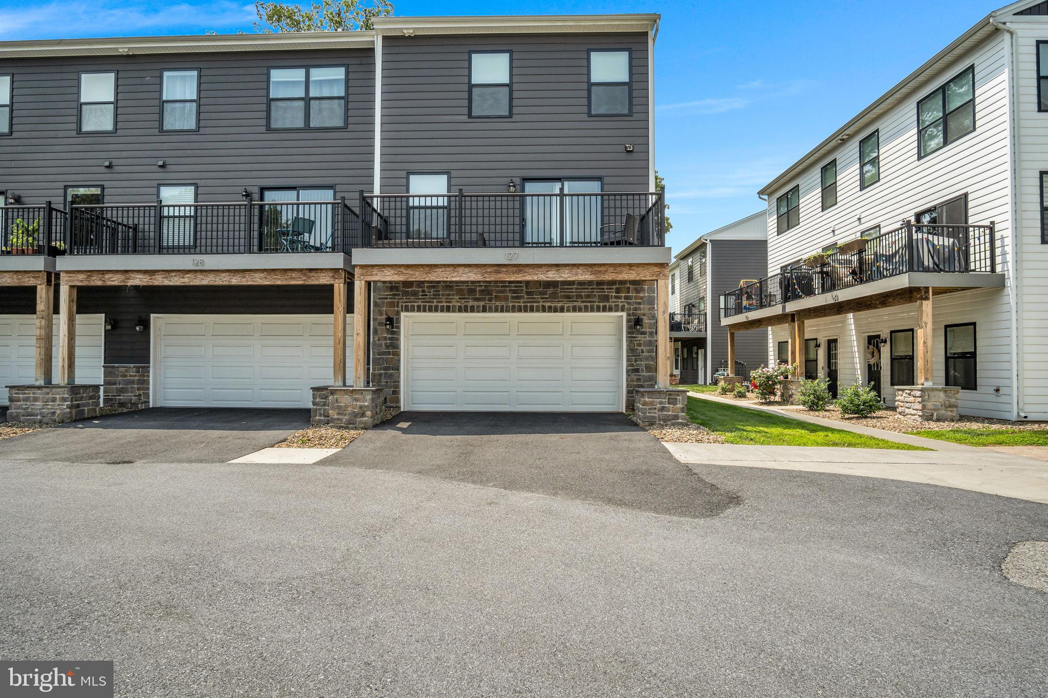 Welcome to 127 High Pointe Dr!
Looking to rent a modern, maintenance free, and luxurious end-unit home? This spacious 2-bedroom, 2.5-bath home with a generous 2-car garage offers the perfect blend of comfort, convenience, and style. Enjoy maintenance-free living with lawn care, snow removal, parking and common area maintenance included, plus access to a private fitness center, community space, community courtyards, and BBQ decks.
Inside, you’ll find abundant natural light, beautiful luxury vinyl plank flooring throughout, and energy-efficient stainless steel appliances—including a gas stove range—perfect for any home chef. The kitchen stands out with its granite countertops, classic white subway tile backsplash, and ample cabinet space for all your storage needs. Step outside to a spacious deck, perfect for relaxing, entertaining, or enjoying your morning coffee.
Upstairs each bedroom offers its own ensuite bathroom and a spacious walk-in closet, with a full-sized Samsung washer and dryer conveniently located on the same level for added ease.
Need extra space? The lower level offers a spacious flex room ideal for a home office, gym, or entertainment area.
All of this in a prime location—just a short walk to Hershey Medical Center, Bullfrog Valley Pond, Shank Park, walking trails, coffee shops, restaurants, and more! Plus, quick access to major routes like the PA Turnpike, 322, and 283 makes commuting a breeze. Sewer/water/trash/recycling is covered by the Owner. Don’t miss out on this great opportunity!