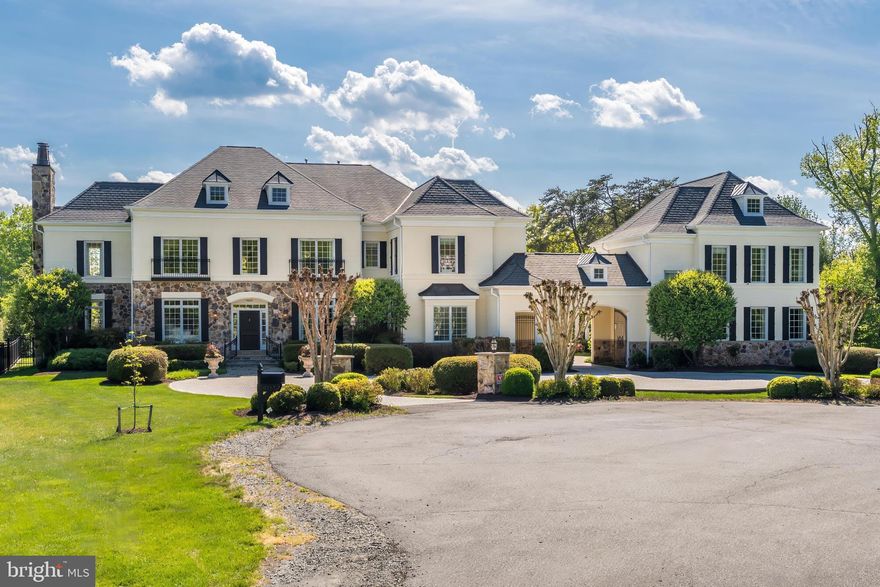 Ready! Welcome to light-filled 9113 Dara Lane, a distinguished estate featuring an incredible separate guest house, ideally located in the prestigious Great Falls community at the end of a quiet, spacious cul-de-sac just minutes from everything!  Situated within a highly rated school pyramid and offering exceptional convenience to Tysons Corner’s premier dining and shopping—including Neiman Marcus—this home perfectly balances privacy with accessibility.

This exquisite residence offers approximately 12,100 square feet of refined living spaces, with 7 bedrooms and 8 bathrooms designed for both grand entertaining and comfortable everyday living. A grand foyer welcomes you and sets the tone for the elegance found throughout. The main level showcases a sophisticated living room, formal dining room, and stately library, all enhanced by timeless architectural details and high-end finishes.

The gourmet kitchen is a chef’s dream, featuring top-of-the-line appliances, custom cabinetry, and an expansive island—ideal for both culinary creations and gathering with guests. Throughout the home, a seamless blend of old-world charm and modern conveniences creates a warm yet luxurious atmosphere.

The primary suite serves as a private retreat, complete with a sitting area and a lavish en-suite bath. Additional bedrooms are generously sized, offering comfort and privacy for family and guests alike.

Perfectly sited on just under 2 acres,  the outdoor spaces provide a serene and private oasis with lush landscaping and ample room for entertaining or relaxing. From quiet mornings on the patio to hosting gatherings, the grounds are designed to elevate everyday living.

This exceptional property presents a rare opportunity to experience timeless elegance, modern comfort, and unmatched convenience in one of Great Falls’ most sought-after locations.

Ready! If you wish to see this beauty sooner than 4/30,  please reach out.