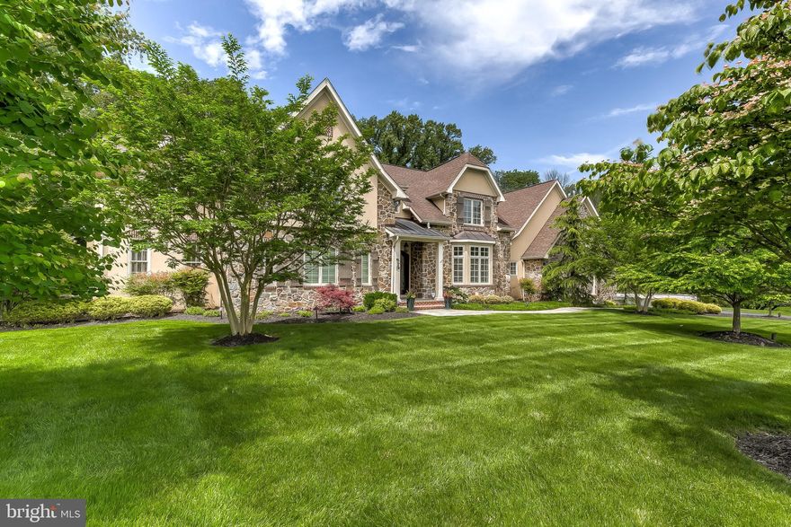 A beautiful authentic stone & stucco french country inspired home welcomes you with custom wood, glass & wrought-iron doors opening into this special, custom Stevenson retreat. Luxury finishes and touches extend throughout, along with sought-after, practical, upgrades. Unrivaled chef's kitchen offers coveted gas cooking, double sized island, heated floors, additional refrigeration drawers, built-in Miele coffee maker and more for the casual or discerning chef. Gather in the sumptuous family room adorned with built-ins and a wood-burning fireplace while opening to the rear bluestone patio. A tranquil master suite is your personal haven, inclusive of a sitting area with gas fireplace, wall of windows, access to patio, dual walk-ins & luxurious ensuite bath w heated floors, jetted shower & tub. The formal dining room, butler's pantry, office with full walls of built-ins, laundry room, large mudroom & 2 half baths complete the main level. The upper level is comprised of 4 bedrooms (each with it's own private bath and walk-in closet), a craft room, sitting nook & awesome, full exercise room. An amazing downstairs is comprised of a full great room with endless possibilities, bar, full bath, bedroom, bonus room with walk-up (all could be an in-law or au pair suite) and storage. Beautiful grounds within a fully fenced rear yard. Three-car side load garage. Some upgrades include: irrigation system, spray foam insulation, geo-thermal heating, tankless water heater, speaker system, Pella casement architect grade windows, 10ft ceilings on the first level, custom cabinetry thru-out, custom window treatments. A magnificent property, ideal for entertaining or enjoying casual time at home, in a quintessential location.