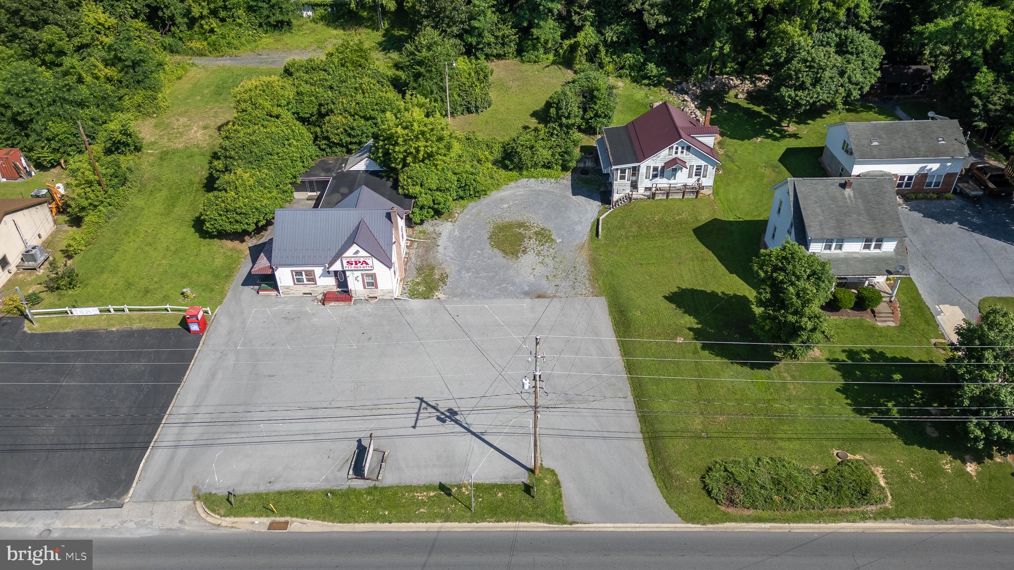 Exceptional commercial land with a great location across from the Wal-Mart plaza in Lewistown. Containing two separate parcels totaling approximately 1.1 acres, this property currently has two rented units on it, one commercial and one residential with ample parking. With high traffic activity from Wal-Mart and the adjacent shopping plaza, this location is ideal for a number of commercial uses!