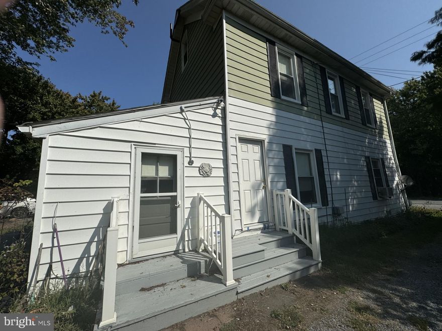 BUYERS FINANCING FELL THROUGH. THEIR LOSS YOUR GAIN!! **INVESTOR ALERT!!** Multi-unit home. First floor features a mud room, full kitchen with laundry connections, living space, full bathroom, and room for a bedroom- Could be used as an efficiency apartment. Second floor, with separate entrance, features a kitchen, living area, full bathroom, bedroom and finished attic/additional living space. Both floors have separate electric bills. Home needs some updating and upgrades. There's a large garage behind the house with two garage doors and ample space for workshop. It also features a floored attic with tons of storage.  Two car carport attached.  Feel safe knowing you could drive around the house in the driveway to enter back on to Dominion Rd, without having to turn around. Close to food and shopping. Easy access to Route 50.