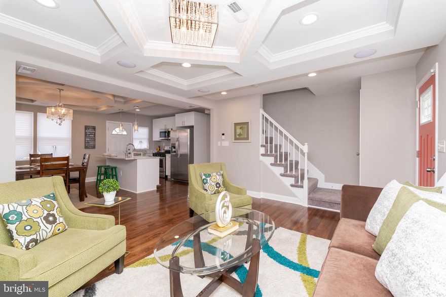 Welcome to "The Walker"...Nestled in the well maintained Idlewood community of Baltimore.  Steps from the county line and Mount Pleasant Golf course, this beautifully crafted renovation boast an open floor plan, with amazing space. Be delighted by the  full chef's kitchen will all new stainless steel appliances, and island for preparing meals and entertaining. Walk on to the deck, that can be used for summertime fun. "Never look for a parking again." Pull into the full parking pad located in the rear. The fully finished lower level has a bedroom, and a full bathroom  with  space for entertaining. The third level has three full bedrooms with a master bath. This home is cable ready, no need to worry, and has built in sound on the main level. Style and class..What are you waiting for? The seller wants you to have this home.