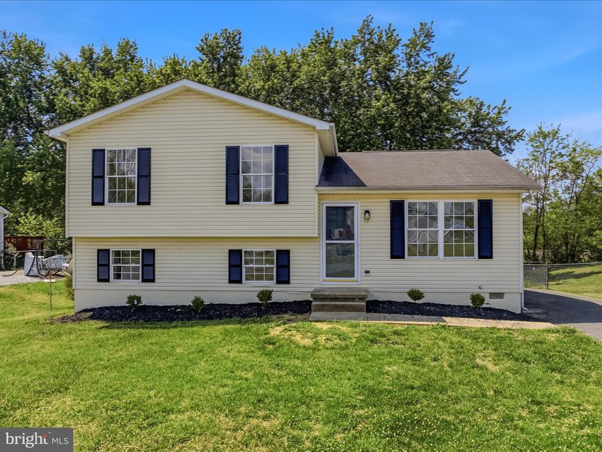 Tucked away on a peaceful cul-de-sac, this beautifully renovated 3-bedroom, 2.5-bath home combines modern upgrades with a warm and inviting layout designed for comfortable everyday living. From the moment you step inside, you’ll appreciate the fresh, updated feel created by brand-new luxury vinyl plank flooring, fresh interior paint, and stylish new light fixtures throughout. The bright and spacious living room offers plenty of room to relax or entertain, while the adjoining kitchen features sleek stainless-steel appliances, updated cabinetry, new countertops and easy flow into the dining area for gatherings and family meals.

The thoughtfully designed main level includes two well-sized secondary bedrooms and a full hall bath, The private primary suite complete with its own ensuite full bath, creates a comfortable retreat at the end of the day. Downstairs, the expansive lower-level family room provides versatile space perfect for a media room, game room, home office, or additional entertaining area. A convenient half bath with laundry hookups add even more functionality to the lower level.

Step outside to enjoy the refreshed rear deck overlooking the fully fenced backyard, offering the ideal setting for cookouts, outdoor dining, pets, or play. A storage shed provides extra room for tools, lawn equipment, or seasonal items. Additional updates, include a brand-new heat pump, offering peace of mind and energy-efficient comfort for years to come. This move-in ready home delivers the perfect blend of modern updates, flexible living space, and a desirable cul-de-sac location.