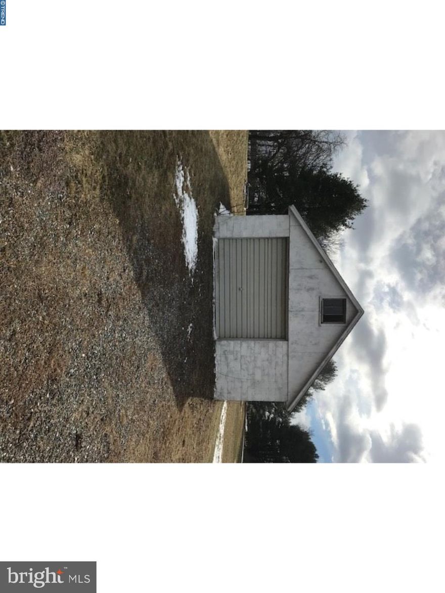 There is a one car garage on the site, a well is located on the site but public water is available, land has perked for a sand mound to the back of the lot. This property is actually located in Newtown. You can use builder of your choice and mobile's are also permitted.