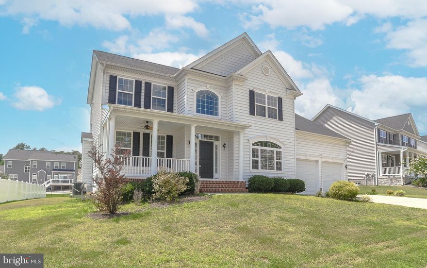 No need to wait for new construction...beautiful 5-bedroom home with all the upgrades.  Huge kitchen with upgraded cabinets, appliances and counter tops as well as a contrasting grey island.  Just off the kitchen is the spacious eating area that opens up to a large great room with stone faced fireplace.  Go from there to the screened in 12X12 porch which is perfect for outdoor entertaining no matter the elements.  Oversized owner's suite with multiple closets and beautiful bath complete with a custom walk-in shower.  Make your way into the finished basement which has another bedroom and full bath and wet bar.  Basement is wired for surround sound and projector which is all routed to the closet for easy access.  You will be in love at first sight!