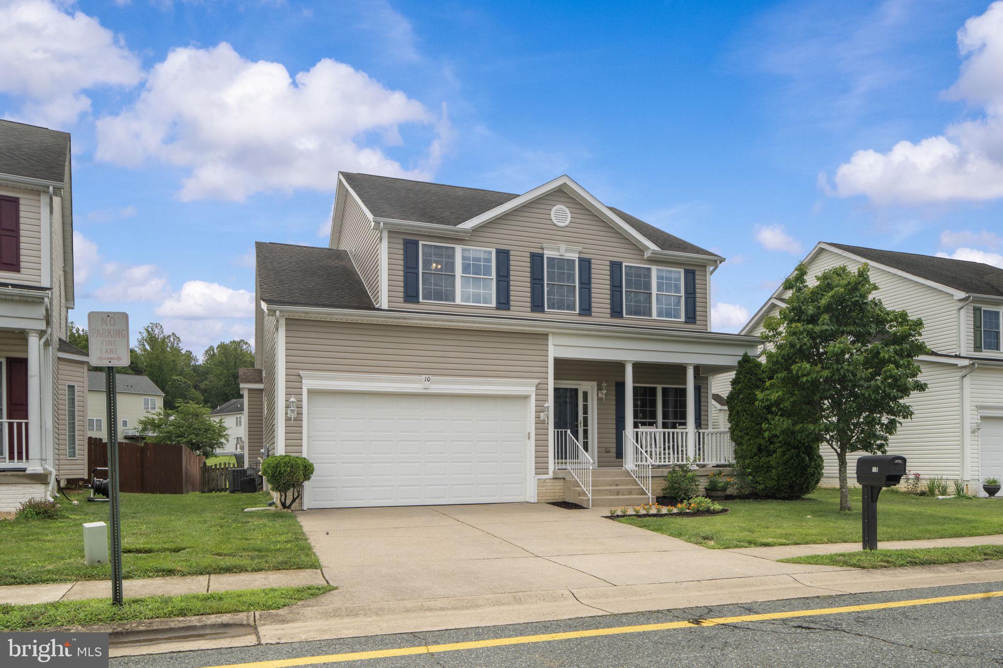 Welcome home to this well-maintained 4-bedroom, 2.5-bath home that offers space to grow! The main level features a spacious living room, formal dining area, and an eat-in kitchen that opens to a large, light-filled family room with big windows and a gas marble fireplace. Step outside to find a fully fenced backyard down the stairs to a patio—great for entertaining. The main-level laundry room, accessible from the garage, also serves as a mudroom. Upstairs, the primary suite includes cathedral ceilings, a walk-in closet, and an en-suite bath with a jetted tub, updated tile shower, and abundant natural light. Three additional bedrooms and a full hall bath complete the upper level. The unfinished walk-up basement. You will have access to other amenities, such as an enclosed dog park, a community pool, and a playground — all within walking distance. The home’s excellent location is ideal for commuting and shopping, as it is close to Route 610, the VRE, Quantico and Ft. Belvoir, providing immediate access to Interstate 95 for commuters. Don't miss this opportunity to Rent this Beautiful home!!