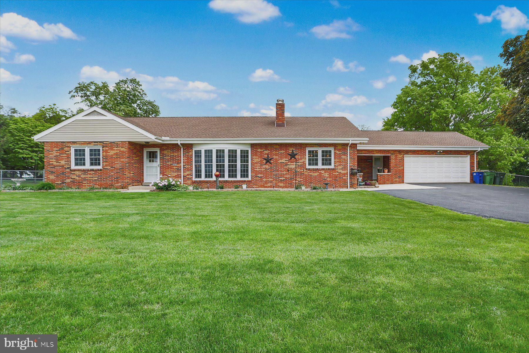 Welcome home to this meticulously maintained all brick ranch home on close to 2 acres. 2500 square feet of living space above grade and wonderful outdoor entertaining areas as well. You will not want to miss this one. The home offers the perfect blend of comfort and charm, all on one level. Featuring neutral paint and décor with original hardwood floors under carpeting. Stepping inside the front door you are welcomed by an oversized bright and airy living room, featuring a beautiful bay window and lovely gas burning fireplace. Move on to the formal dining room to enjoy family dinners. Enter the charming eat-in kitchen with plenty of cabinets, solid surface countertops, and stainless steel appliances. This home has a private and spacious primary bedroom with a beautifully updated bath , seamless doors, walk-in tiled shower and heated floors. The three additional bedrooms and updated main bath are located in their own wing of the home. The partially finished lower level with full kitchen, dining area and family room is expansive. A large fifth bedroom and full bath makes this home perfect for multi-generational living. Hot water- baseboard heat keeps home cozy & warm. Summer will be here before you know it and this home is perfect for the much loved Stay-cation. Newer over sized deck with awning in rear yard surround a large 22x43 heated pool that you will spend the dog days of summer basking in the sun and warm summer evenings relaxing in to recharge for the next day. All this plus a huge 16x18 pool house, man cave, she shed....you decide, this additional building can be whatever your heart desires. Lovely patio area great for evenings around the firepit, recently planted flower beds and 2 additional sheds round out this great level entertainers back yard. New Architectural shingled roof 2024, newer AC, 2 zoned hot water baseboard gas heat, whole house fan, replacement windows on all levels . Conveniently located, minutes to highways, shopping, and amenities. They don't build them like this anymore. This home is truly unique. You don't want to miss out on this fantastic home. Schedule your showing today!