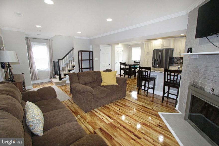 Welcome to your new home sweet home! Located just inside the city limits on a quiet cul de sac, modern cozy home is beautifully updated. Upon entering you are immediately greeted with sparkle! The bright open main level includes a living space with a wood burning fireplace, large kitchen with granite countertops, dining area, and a powder room, A covered side porch is accessible off the kitchen. Upstairs has 3 spacious bedrooms and a full bath.  The lower level recreational area can double as a guest space since it includes a gorgeous spa-like full bathroom.  The ample yard includes a shed for storage and green grass for playing! Roof is new. This cozy home sits on a quiet street in a well established neighborhood. Don't miss the opportunity to benefit from a county setting in the city! *1 year American Home Sheild Warranty included.