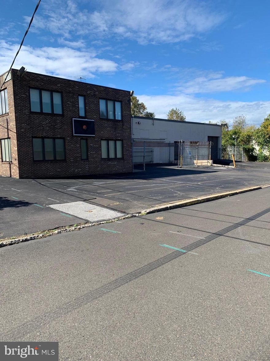 1000 Washington Avenue Croydon is your next prime business location  a true gem in the rough.  This is a perfect location for a growing manufacturing or light industrial business   let your imagination create a space that works for you.   A business that needs a lot of space to house their distribution, sign, beer/beverage distributor, vending company, large scale restaurant/catering distribution company, manufacturing or industrial type of company (just to name a few options).   The property is zoned M1 (light industrial & manufacturing) and has approximately 27,600 square foot of space. Breaking down the square footage, there is 5,280 square feet of office space and 22,320 square feet of warehouse space.  The office section includes three private offices and two newly renovated restrooms as well as one executive office that includes a private restroom with stall shower. The second floor includes a private office and conference room.   The main warehouse is heated with suspended gas heaters while the warehouse shop has heaters and air conditioning.  The warehouse has ceiling heights of 16 0  that slopes to a lower height of 15 9 .  There are two loading dock doors in the front of the building and four additional drive-in doors at varying building locations.  Building has been updated with T-8 lighting throughout, ceiling paddle fans, suspended natural gas-fire blower units and natural gas radiant units. The second floor of the warehouse has additional space for a break room with sink and coffee station.   This floor also has two newly renovated restrooms.  As you continue your tour, the exterior brick and block construction is built soundly.  There is plenty of parking in the front as well as the side of the building.  Outside lighting is mounted on the building walls.  The building is equipped with a security system and fire alarm system.   For additional security the property is completely fenced.   Your new business location is conveniently located within minutes of I-95, the PA Turnpike and the N. J. Turnpike. Close to major airports which include 35 minutes to Philadelphia International (PHL) and approximately  50 minutes to Newark Liberty International EWR).  Within walking distance to Croydon Train Station.  Listing agent  related to seller.