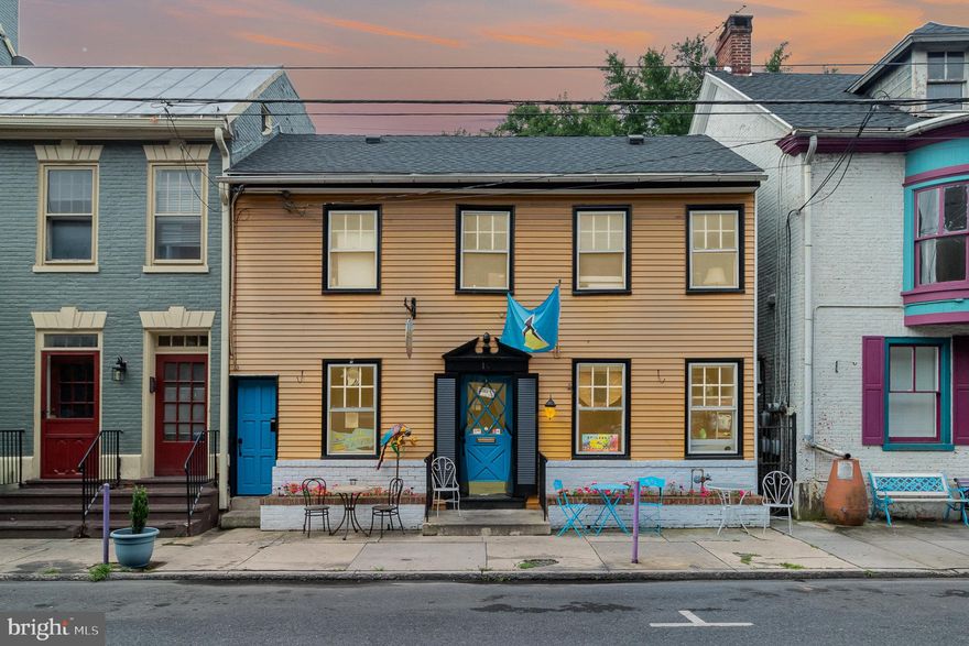 This is your chance to own a piece of Carlisle’s vibrant downtown scene with this charming and versatile mixed-use gem nestled right in the bustling heart of downtown Carlisle! This two-unit property offers the perfect combination of vibrant street-level commercial energy and peaceful upper-level residential living, making it a standout opportunity for both investors and owner-occupants alike. On the first floor, you'll find a well-established tenant of B&L Caribbean Restaurant, a local favorite known for its warm, island-inspired atmosphere and authentic flavors straight from St. Lucia. The restaurant’s loyal following and colorful outdoor seating area create a lively vibe and steady foot traffic – a bonus for long-term stability and visibility. Upstairs, the residential unit is accessed through its own private entrance at street level, offering both convenience and privacy. This sunny second-floor apartment includes two spacious bedrooms, a large living room, and fresh paint throughout. Gorgeous hardwood floors add warmth and character, while ample natural light gives the space a bright and inviting feel – perfect for tenants looking to enjoy downtown living with a peaceful retreat above the action. Whether you're seeking a strong income-generating asset or a creative blend of business and lifestyle, this versatile property checks all the boxes. Located in Carlisle’s Historic and Business District, just steps from boutique shops, popular eateries, and community events, this property is truly in the center of it all.