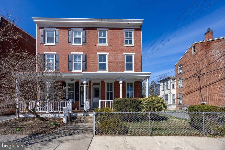 ATTENTION INVESTORS and Buyers looking to build sweat equity! Come see the potential that this 5 bedroom, 3 story brick twin offers. Nestled on a one-way street, just 3 blocks off High Street, this property offers a convenient location with reduced traffic flow. The home has been occupied by its original owner for over 60 years and it’s now time for a new buyer to restore its charm and character. The main level with high ceilings offers a spacious floor plan that includes a vestibule entry, expanded living room, dining room, kitchen and shed leading to the fenced yard. There is plenty of room to expand the kitchen, add a powder room and laundry facilities and still have room left for a nice sized great room. The 2nd floor offers 3 bedrooms and 1 bath and the 3rd floor offers 2 bedrooms with one of the bedroom closets accessing the attic. The 3rd floor could potentially be converted into a primary bedroom with en suite bathroom. Some updates have been made, such as the gas heating system and related piping (2021), front porch floor and rails (2016), and replacement of the kitchen roof with some repairs to main roof and porch roof (2017). With the side yard along Mechanics Alley, there’s potential to create off-street parking. This home needs work, offers lots of potential and is priced accordingly. It is being sold in ‘as-is’ condition.