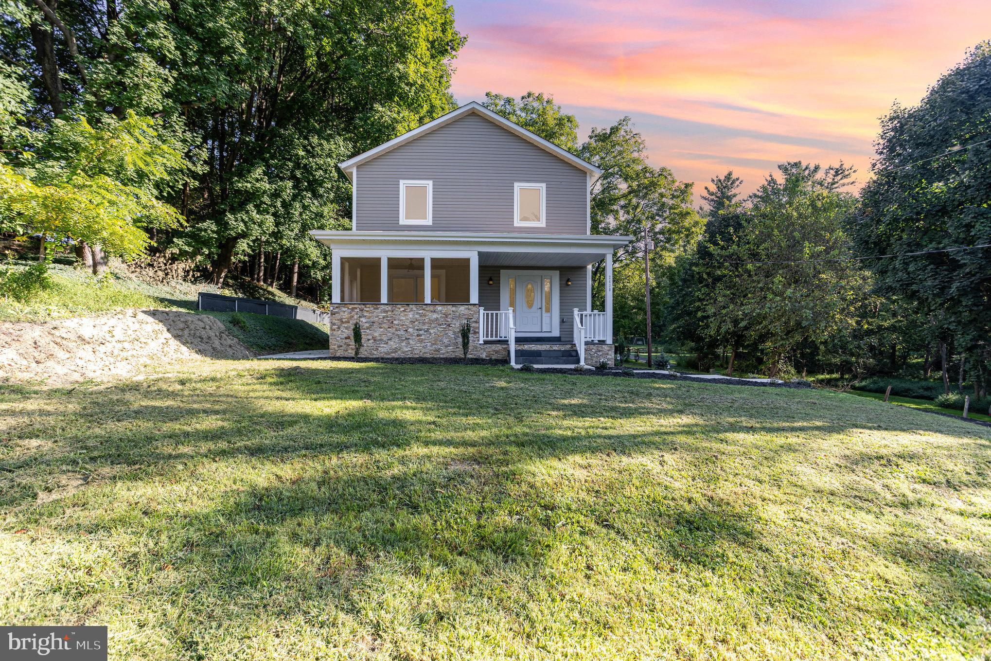 NEW CONSTRUCTION in Parkton! Welcome to 2430 Harris Mill Rd. This beautifully crafted home offers over 2,700 sq ft of finished living space on a spacious 1+ acre lot. Featuring 4 bedrooms and 4.5 baths, this home includes two primary suites (one on each floor) providing flexibility for a first-floor family room or den. Highlights include a well-appointed kitchen, elegant bathrooms, gleaming hardwood floors on the main and upper levels, and a finished basement with full bath. Outdoor amenities include a covered front porch, an additional screened-in porch with grill, a spacious patio, large yard, and extended driveway. Easement on property.