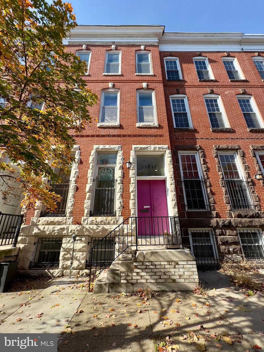 Step into this inviting four-bedroom interior row townhome that combines modern comfort with timeless charm, located in the heart of Baltimore’s historic and lively community. Designed with a spacious layout and well-thought-out finishes, this home offers both functionality and style across multiple levels.

The living area welcomes you with warm wood flooring, neutral tones, and abundant natural light that creates a bright and airy atmosphere, perfect for both relaxing and entertaining. The kitchen features tiled flooring, sleek built-in cabinetry, a stylish island counter with a breakfast bar, and stainless steel appliances including a refrigerator, dishwasher, cooktop, and double ovens. A tiled backsplash adds a touch of sophistication, and the rear exit opens to a paved, fenced backyard, offering a private outdoor space ideal for gatherings or quiet evenings.

On the second level, you’ll find two well-appointed bedrooms with LVP flooring, generous natural light, and ample closet space. The bathroom on this floor includes tiled finishes, a soaking tub, and a modern vanity setup. The third level continues the comfort with two additional bedrooms, each featuring LVP flooring, ceiling fans, and closets. The second full bath provides dual sinks, a tiled bath, and a relaxing soaking tub.

The finished basement offers flexibility with an extra room, wall-to-wall carpeting, a full-length mirror, and a half bath, ideal for a guest suite, office, or fitness area. The laundry room, equipped with a washer and dryer, adds convenience to your everyday living.

Street parking is readily available. Cats are welcome with a $500 non-refundable pet fee and a pet addendum (no other animals permitted).

Enjoy the best of city living while being close to key landmarks such as:

Penn Station – convenient access for commuters

University of Baltimore and MICA

Mount Vernon Marketplace and cultural district

The Walters Art Museum

Johns Hopkins University Homewood Campus

Inner Harbor and Downtown Baltimore

Agency disclosed upon initial contact. Agent conducts showings; BMG manages follow-up, paperwork, move-in post-approval. Vouchers work with BMG directly.