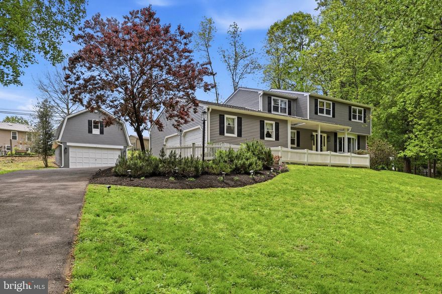 Tucked away on an absolutely breathtaking park-like lot in one of the area’s most sought-after neighborhoods within the Neshaminy School District, this stunning 4-bedroom, 2.5-bath colonial is the perfect blend of character, space, and timeless charm.

From the moment you arrive, the setting speaks for itself. A welcoming front porch lined with rocking chairs overlooks the gorgeous property, creating the perfect place to unwind and take in the peaceful surroundings.

Inside, the home offers an incredible amount of living space, including two separate living rooms, a formal dining room, eat-in kitchen, laundry room, basement, and an enclosed sunroom filled with natural light.

Upstairs features three generously sized bedrooms with a hall bath, along with a spacious primary suite complete with its own private ensuite bath and an additional sitting room drenched in sunlight from skylights and surrounding windows — the perfect space for a home office, reading nook, or relaxing retreat.

Step outside to a beautiful brick-laid back patio overlooking the expansive backyard, offering the ideal space for entertaining, morning coffee, or quiet evenings surrounded by nature.

Adding even more versatility, the property also includes an attached two-car garage plus an additional detached two-car garage with cathedral ceilings — ideal for car enthusiasts, hobby space, storage, workshop potential, or endless possibilities.

Homes with this kind of lot, charm, and location rarely become available. A truly special property offering privacy, beauty, and timeless appeal all in one unforgettable setting.