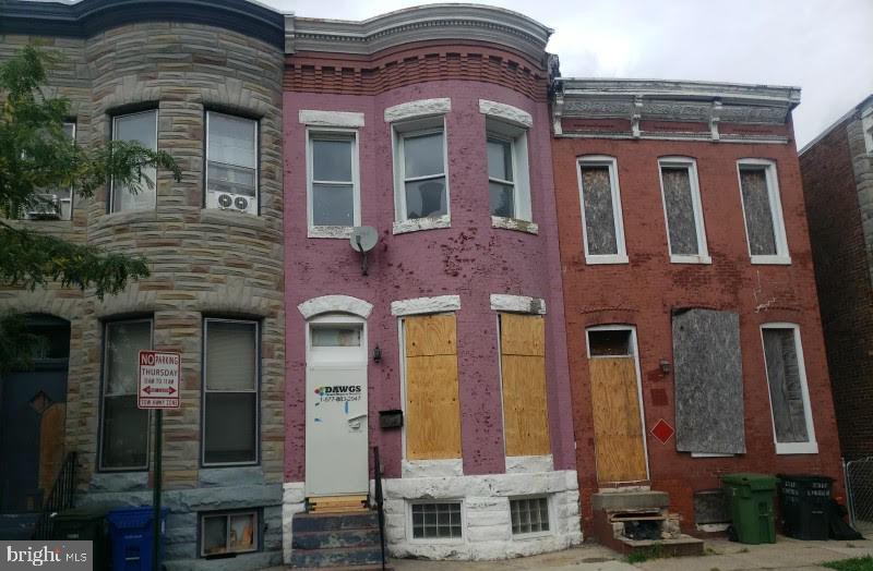Investment opportunity to purchase a 3 bedroom 1 bathroom interior rowhome with a separate dining room. Close to Druid Hill Park.
