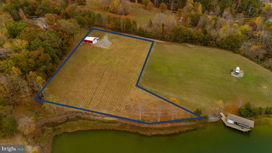 NO HOA! Welcome to your dream waterfront paradise on the picturesque shores of Lake Anna, Virginia! This remarkable 1.69-acre lot boasts approximately 230 feet of pristine shoreline, inviting you to embrace the serene beauty of lakeside living. The lot is thoughtfully cleared, providing an ideal canvas for your dream lakefront home and boat house. Adding to its allure, an adorable, oversized metal garage stands tall, ready to accommodate your RV, boat, and all your aquatic equipment. Whether you're relaxing on your dock or taking in the breathtaking views, you'll be captivated by the tranquil ambiance of the public side of Lake Anna. The neighborhood offers a convenient boat ramp and a single dock, ensuring easy access to the water. This is your opportunity to create a lifetime of memories in a haven surrounded by nature, where each day promises endless fun and relaxation. Don't miss out on this extraordinary waterfront gem!