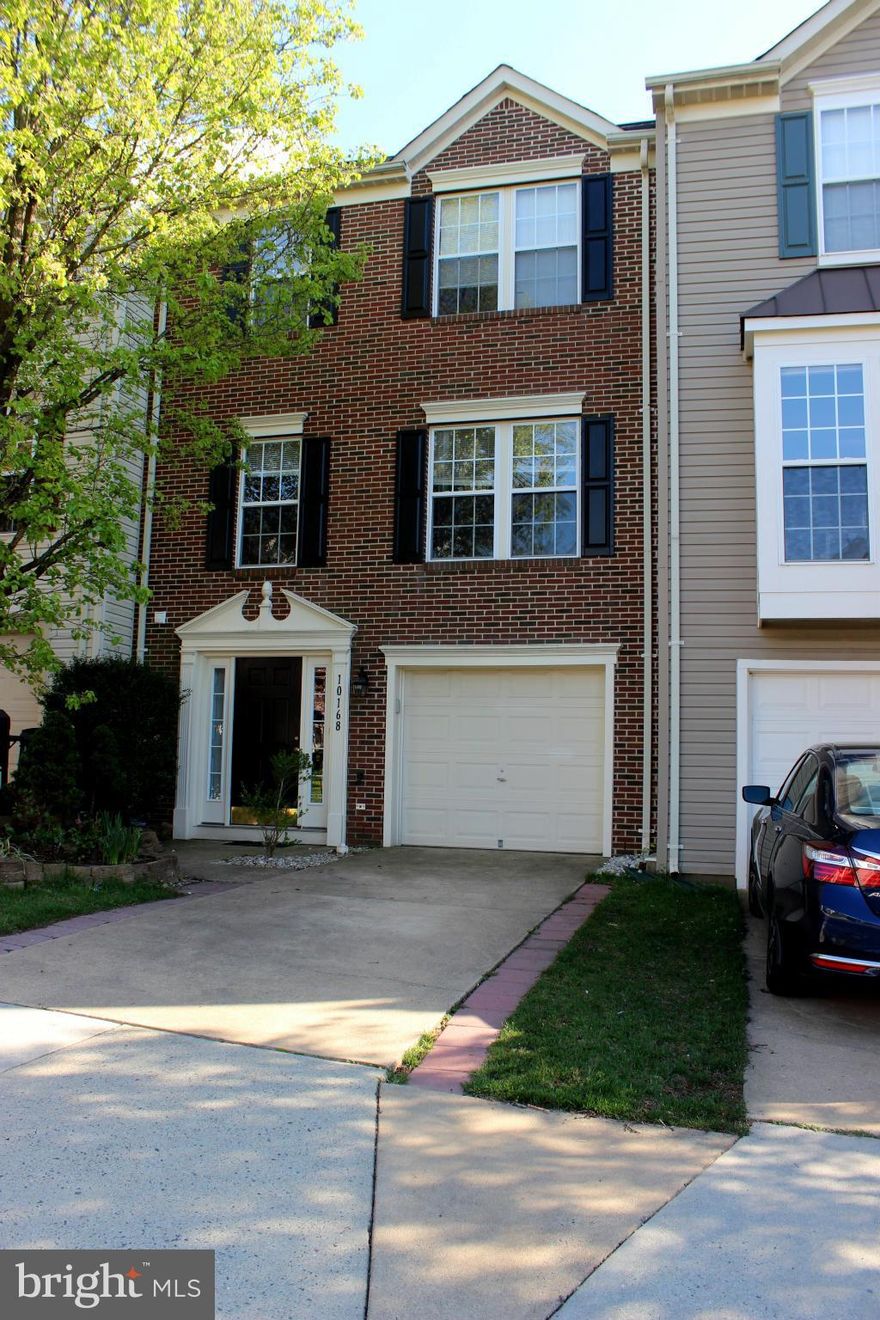 Ready to move in!! Well maintained townhome with one car garage & three level bumpout! Upgrades include Hardwood Floors, Custom Paint, SS appliances, Fireplace, Updated Bathrooms, Ceramic Tile in all Bathroom, Back-splash, Deck & Fenced in yard. Ample of visitor parking & walkout basement with Stone Patio. Walk to the Elementary School, Patriot High School. Close to Shopping & Restaurants.