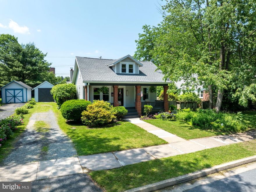 Charming craftsman-style bungalow located just blocks from downtown and campus.   This home offers one floor living, a relaxing covered front porch and spacious yard, French doors,  window seats, built-ins and hardwood floors.   The kitchen is bright and features newer appliances, quartz countertops, and a lovely stained glass door.  The dining living area is spacious and perfect for entertaining and everyday use.  The upper half-story has a bedroom, full bath, office/den and bedroom with egress window.  The lower level ores a family room, office/den, bedroom with egress window, full bath, and laundry room.  Just a few of the updates since purchase include a new roof and gutters, fencing, attic insulation, new boiler in 2025 and more.  Note: Ferguson Twp. allows student home with proper permits.  One-car detached garage.