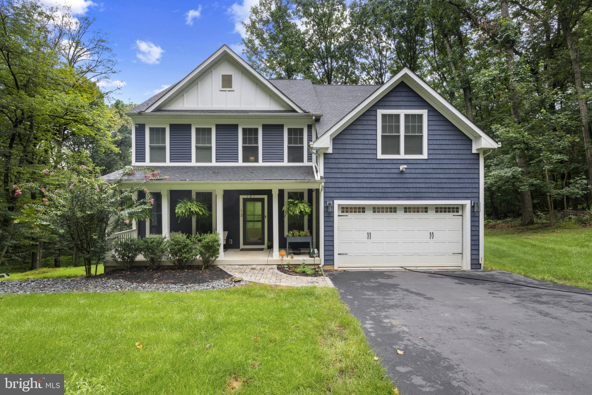 Stunning 4 bedroom 5 bath modern, custom-built colonial located in the highly sought after community of Sagamore Forest. Private, tucked away, serene, and located on over 2+ acres, this 4,300+ square foot home, built just over 5 years ago, awaits with high-end finishes throughout. The main level offers open concept living, beautiful hardwood flooring, and a spectacular gourmet kitchen featuring marble waterfall countertops, a breakfast bar, stainless steel appliances, recessed lighting, farmhouse pendant lighting, smart faucet, a custom shiplap tray ceiling, plentiful cabinet space, and a mudroom leading to extra closet space and a two car garage with newly installed storage rack. The kitchen flows effortlessly to a warm and inviting family room which features a gas fireplace, coffered ceilings, and a custom decorated accent wall. The kitchen and family room open to a large 30x12 deck facing tall beautiful trees...the low maintenance deck offers the perfect amount of space to entertain family and guests...There is a transom window at the entrance of the deck allowing plenty of natural light back into the main level...There is a separate formal dining room on this level, graced with custom decorated walls, wainscoting, tray ceiling, and bay windows. Steps away is a private office with French doors and for added convenience, a powder room is located at the front foyer. On the upper level, there are four bedrooms, three full bathrooms and a laundry room. The expansive primary suite offers a spacious, custom built walk-in closet, recessed lighting, full ensuite bath with dual vanity sinks, granite countertops, separate soaking tub, and a spacious marble rain shower. There is a second expanded bedroom offering a private sitting area, walk-in closet and full ensuite bath. Two generously sized bedrooms and a Jack and Jill bath with granite countertops complete the upper level. The lower level doesn't disappoint and offers a large open space currently being used as a 2nd family room, exercise area, and additional office space. There is a full bath on this level with sliders to the backyard and shed. The highlight of this level? The theater/media room! Grab your popcorn, relax and enjoy your favorite movie. After watching a movie, head outside to enjoy a firepit moment, or walk down a few more feet and hang out at the pond. There's so much beauty to behold in this space. The property has been well maintained with additional updates throughout the home and exterior of the property, including new carpet, new garbage disposal, new exterior lighting, upgraded designer light switches, and smart fans installed in the family room and guest suite. Additional installations include a home steam generator humidifier, spin down water filter, upgraded 80 gallon high efficiency water heater, upgraded wired networking throughout, backyard concrete bank stabilization, a dry creek bed and retaining wall. The backyard landscaping has recently been updated. There is also an expanded driveway and parking pad offering many flexible uses for additional vehicles, recreational and outdoor toys, etc. Although tucked away, you are within minutes from shopping, restaurants, and major access routes. Grab your morning coffee and pastries from Santonis, the specialty marketplace grocery store, located less than five minutes away! It's all here! Schedule your private tour today. This one will not last long!