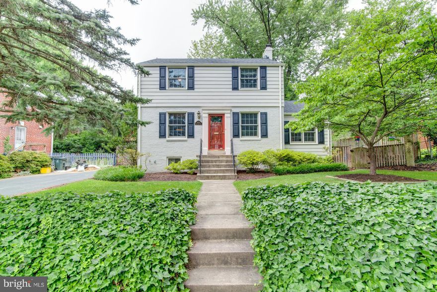 Charming updated/immaculate 3br 2ba Col home in a lovely neighborhood. Bus  a few steps away Bike lanes easy access to shops & major commuter roads=tip top location! 3 fully finished levels custom built-ins chef's kitchen w/42" cabinets family room opens to deck/flat yard established garden wood flrs carpeted lower level sep laundry rm.  Neutral paint replacement windows. Easy to call this home!!!