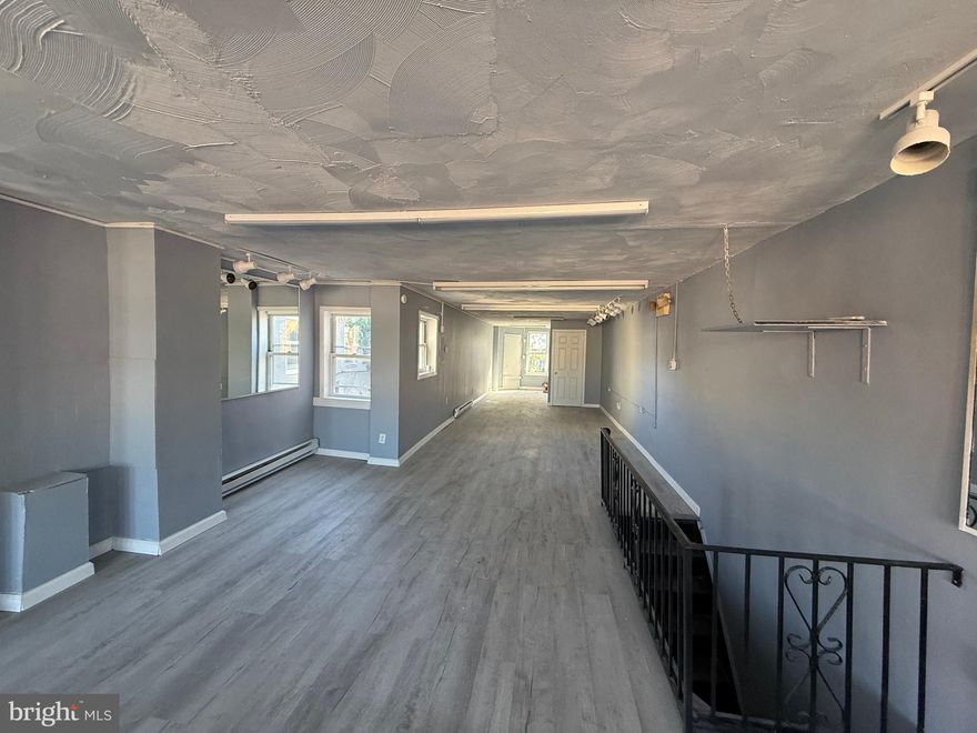 2nd floor unit available for rent in the busy 52nd St shopping area. Large spacious unit ready for you to set up shop.  Ideal for an office, studio, flex space. High walking traffic off of a major intersection.