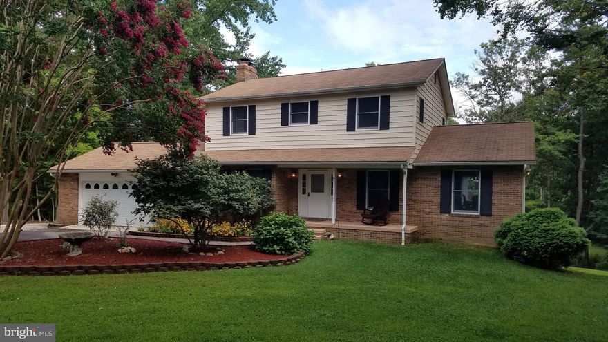 Fabulous Farmhouse Style home on 7.9 acres features 4 BR's, 3 1/2 BA's, Full-length Deck on back of house with a hot tub.  Separate 24x26 2 car Garage/Shop in back & 2 car attached Garage are both heated & cooled. Upstairs Baths upgraded. Fresh paint throughout! Fully Finished 772 SF Basement with Rec Room, Wet Bar, Full Bath, Office/extra bedroom, and utility/storage room. HSA warranty.