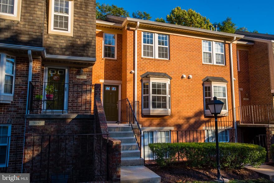 LOCATION! LOCATION! LOCATION!   Offers with pre approval letters due by evening of Tuesday, November 10.   Welcome to this charming brick townhome condo in the gated Montgomery Chase Community.  This spacious 2 levels of living space boasts 3 BR and 2.5 BA.  Recent updates include fresh paint throughout, gleaming engineered wood floors on the main level and carpeting on the 2nd level.  Ceramic flooring in hallway and kitchen.  Separate laundry closet with recently added ventless stackable washer/dryer.   Large kitchen features granite counters,  a gas stove,  and plenty of cabinets.  Generous bay window fills the kitchen with lots of natural sunlight including a "bumped-out" window seat.  Spacious open concept living/dining room opens to a private balcony. Upstairs features 3 sizable  BR and 2 full BA.  Assigned parking with ample visitors parking spaces available.   Amenities include a tot lot and outdoor swimming pool.   Minutes to Glenmont Metro Station, parks, entertainment, and shopping.   Conveniently located near major commuter routes such as   ICC, 355, & 270.   Absolutely magnificent and move in ready! An incredible opportunity to make this home yours!