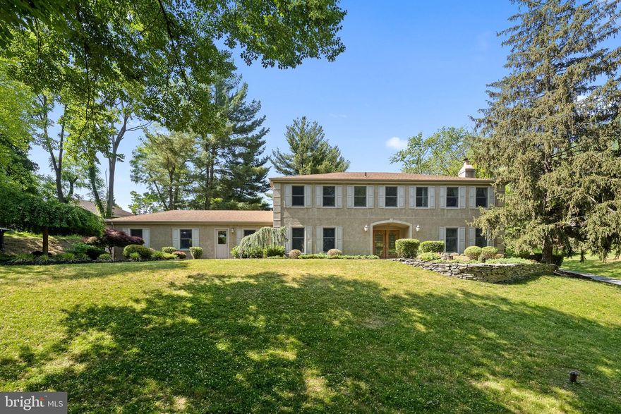 Welcome to 1214 Chermar Lane in Penn Valley! This stunning colonial home offers a spacious and elegant living environment and is situated on a picturesque street offering breathtaking views and privacy. This home provides a tranquil retreat with a multitude of features that make it ideal for comfortable living and entertaining. Upon entering, you will be greeted by an inviting foyer that sets the tones for the rest of the home. To the right is the formal living room, adorned with window bench seats and a cozy gas fireplace, perfect for relaxation. The living room also features built-in shelves with a convenient wine cooler. Adjacent to the living room is a comfortable family room, complete with a wood-burning fireplace and surround sound system. This space provides a versatile area for entertaining or quiet relaxation. Throughout the main floor, hardwood floors add an element of sophistication and durability. Connected to the family room is a well-appointed kitchen, featuring a large island and a cozy breakfast area. The kitchen has been completely renovated and boasts stainless steel appliances, granite countertops and plenty of cabinets for storage. Additionally, there is a powder room and a door leading outside to the yard. The wide-open living spaces throughout the house are perfect for hosting parties and social gatherings. The layout lends itself to seamless entertainment, allowing guests to move freely and enjoy each other's company. Moving to the second floor, you will discover the primary bedroom suite, which includes a full bathroom with granite counters, double sinks, built-in cabinets, and a power shower head. The primary bedroom also features a walk-in closet and opens to a charming sitting room or office, which could also be used as a fifth bedroom, as it has access from the hallway. The 3 additional bedrooms have all been updated with new carpeting, ceiling fans, lighting, and solid-core closet doors. The two hallway bathrooms have also been updated with new tile, toilets, and granite countertops. The lower level of this home is fully finished and offers versatile spaces for various activities. It includes an exercise room, den, a second kitchen, and a powder room. Furthermore, the basement provides ample storage space and conveniently walks out to the pool area. Outside, you will find a delightful flagstone patio accessible through sliding glass doors from the kitchen. The patio overlooks the inviting pool, creating a fantastic outdoor oasis for relaxation, entertaining, and enjoying the beautiful surroundings. Nature enthusiasts will appreciate the regular wildlife sightings on the property, from deer and bunnies to a groundhog family and the occasional baby fox, adding a touch of natural beauty to your surroundings. Additionally, there is a two-car attached garage with updated doors and openers. 1214 Chermar Lane presents an exceptional living experience with its elegant design, high-quality finishes, and numerous amenities. Maintaining this house is a breeze, thanks to the renovations that focused on low-maintenance finishes. With easy-to-clean surfaces and efficient systems, you can spend less time on upkeep and more time enjoying the home and its amenities. From the inviting main floor to the comfortable bedrooms and versatile lower level, this home offers the perfect blend of style, functionality, and comfort for modern living. It also offers easy access to shopping, dining, and entertainment options. Additionally, its convenient location allows for quick and effortless travel to Philadelphia International Airport (PHL) and King of Prussia (KOP), ensuring seamless connections to both domestic and international destinations.