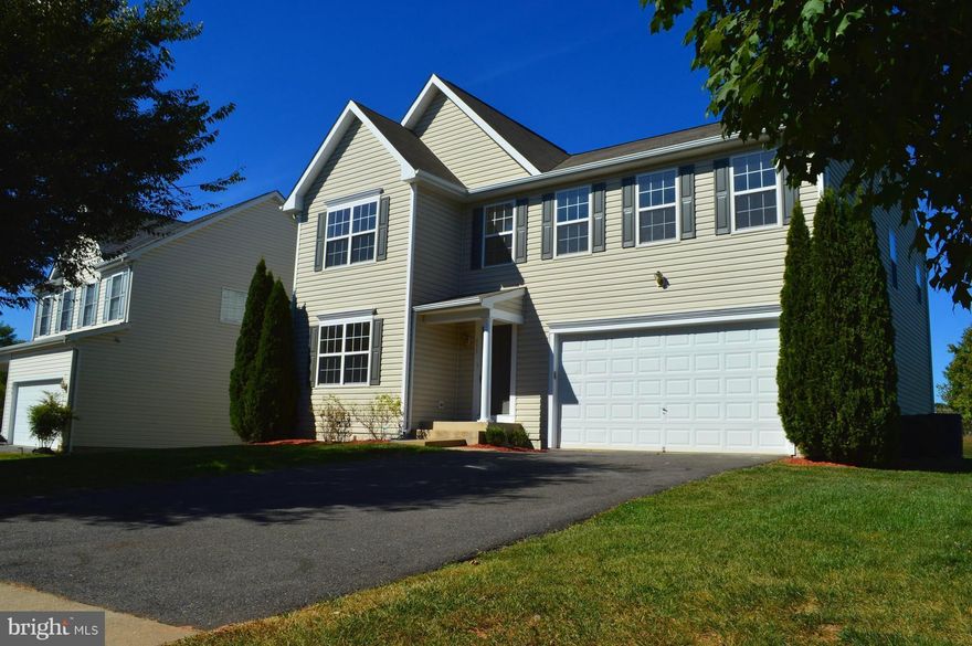 Immaculate Colonial on a large corner lot! Walk in to a Sitting/Dining Room Combo with beautiful dark hardwood floors. Family room with gas fireplace open to spacious Kitchen and Eat-in-Dining. Upstairs you will find 4 large rooms, w/an open loft area. Enjoy the Master w/3 closets!! The basement is partially finished with 2 rec rooms and a full bath! New Carpet and paint. THIS IS A MUST SEE!