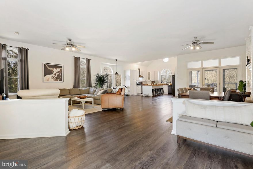 Incredible updates throughout this "like new" renovation in Fallston Schools on over an acre of totally usable land.   This is an incredible location just minutes from I-95 and all of the conveniences of Bel Air while being in the highly favorable Fallston School district. This home has been fully renovated over the last few years.  It is truly an "Open Floor Plan" with the main living and dining area open directly to brand new kitchen.  The main level includes the owners suite, an additional bedroom & bathroom + a full sized laundry area.  Upstairs is another private suite.   The basement is brand new as well.   The list of updates is endless:  enormous basement was fully finished in 2021 which includes a large rec room, full kitchen area, bedroom, bathroom, gym area, + more.  Perfect for an in law suite!  Natural Gas Added in 2020.  All new "black stainless" GE appliances in kitchen in 2020.  New HVAC in 2019.  Massive rear covered deck was refinished & painted & updated with staircase to backyard in 2021. All bathrooms including the gorgeous owners bathroom are all new in 2021.  New chimney Liner in 2021.  Basement Kitchen added in 2022.