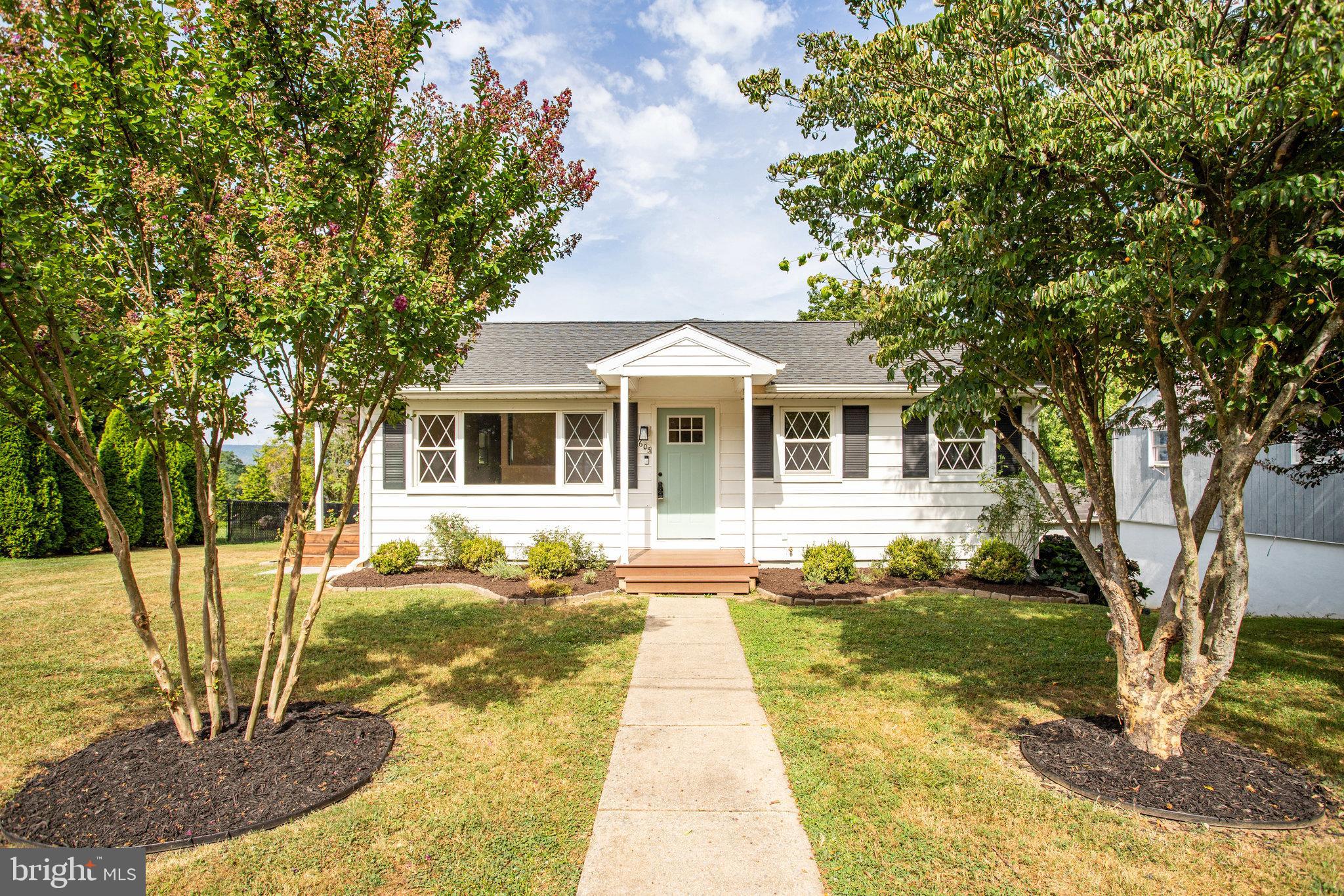 Professional photos coming Friday, 8/15!! Welcome home to 605 6th Avenue in Brunswick! This amazing home was updated and expanded in 2019 including a large primary suite, breakfast area, and deck and the roof, HVAC, water heater, and all appliances were all updated as well. A covered front stoop and beautiful landscaping greets you after passing between the large crepe myrtles from the street. Upon entry warm hardwood floors extend from the living room into the bedrooms to the right. Enjoy the expanded primary suite with walk-in closet and bathroom. Laundry was also moved to the main level for easy access. In the kitchen you'll find a full suite of stainless appliances, tons of cabinet and counter space. From the breakfast area addition a sliding glass door guides you to the elevated deck with spectacular views of the western skyline. Your walkout basement provides tons of storage space and a French door to the covered patio with accent lights and hot tub/spa. In the back yard an expansive, fenced, garden space is ready for your green thumb and the shed provides storage for all your favorite tools and toys - lawn mower included! Don't miss out on this beautiful home, schedule your private tour TODAY!