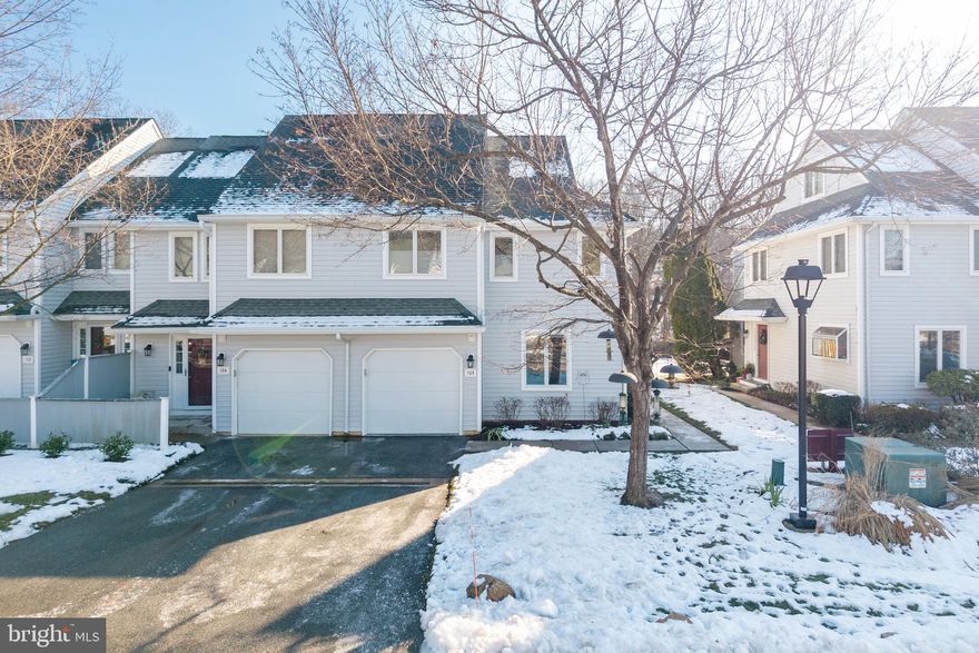 Sun-filled and beautifully maintained, this 3-bedroom, 2½-bath end-unit townhome in sought-after Orchard Valley enjoys exceptional privacy with peaceful, tree-lined open-space views. A welcoming side entry opens to a spacious foyer with a discreet powder room, setting the tone for thoughtful design throughout.
The main level features hardwood floors and a dramatic vaulted great room filled with natural light from skylights and a Palladian window that frames serene green views. A wood-burning fireplace anchors the space, while French doors lead to a private Trex deck with privacy screening—perfect for morning coffee, birdwatching, or unwinding at day’s end.
The spacious kitchen blends style and function with granite countertops, black appliances, generous workspace, and a convenient breakfast bar/island ideal for casual meals or entertaining. Conveniently located off the kitchen is the access to the one car garage with built-in storage. 
Upstairs, the primary suite offers a walk-in closet and a private four-piece ensuite bath featuring a whirlpool tub. A second bedroom, full hall bath, and convenient laundry closet complete this level. The third floor provides an expansive third bedroom or ideal home office, along with a large storage closet.
The finished basement adds flexible living space with new LVP flooring (sectional sofa included) and a separate storage/utility room. Freshly painted and truly move-in ready, the home also features a new heat pump (2025) with a transferable 10-year parts & labor warranty and a hot water heater replaced in 2023.
Skylights, patio doors, Palladian window & loft window tinted to minimize heat impact in summer. The HOA covers snow removal, exterior maintenance, lawn care, and common areas—offering low-stress, lock-and-leave living. Ideally located just minutes from historic Kennett Square, Longwood Gardens, and Centreville, Delaware, with easy access to Wilmington, West Chester, and the Great Valley.