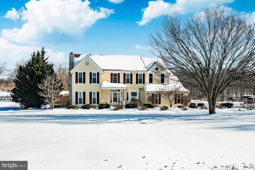 If you have been searching for acreage, privacy, no HOA, outdoor living, and a home that truly feels like an escape, this is a rare opportunity you will not want to miss! Country Charm Meets Modern Comfort at 11 Meadow Wood Lane. Discover the perfect blend of privacy, space, and style in this 4-bedroom, 2.5-bath home tucked away on a 3.6-acre lot in the Meadow Woods community. With views of the neighboring farm and surrounded by mature trees, and open green space, this home offers peaceful living with all the upgrades you’ve been waiting for. Step through the front door into a two-story foyer-The layout flows beautifully from room to room. Freshly painted from top to bottom, including all trim, this home feels brand new and move-in ready. The open-concept kitchen includes granite countertops, glass tile backsplash, stainless appliances, and a large center island —overlooking the family room featuring a flagstone fireplace and custom built-ins. Sliding doors lead out to multiple decks, including a 20x40 in-ground pool (with a new liner and filter), a hot tub, and a beautifully built pavilion complete with ceiling fan, lighting, built-in seating, speakers, and TV—ideal for entertaining! The backyard also features a dedicated play area for kids, complete  with approved playground mulch—ready for hours of fun. Upstairs, the primary suite with dramatic cathedral ceiling, includes a sitting area, large walk-in closet, and large bathroom. Three additional generous size bedrooms share a full bath. The finished basement adds flexible space for a gym, game room, or media lounge. New light fixtures, hardware, and flooring make this home completely turnkey. Additional features include newer septic (2018), inspected well (for peace of mind) AND a newly purchased propane tank, giving you the flexibility to choose your own provider. Just minutes away, enjoy all that Fair Hill and White Clay Creek have to offer—hiking, fishing, biking, horseback riding, and more. This is a one-of-a-kind opportunity in the Avon Grove School District you won’t want to miss!