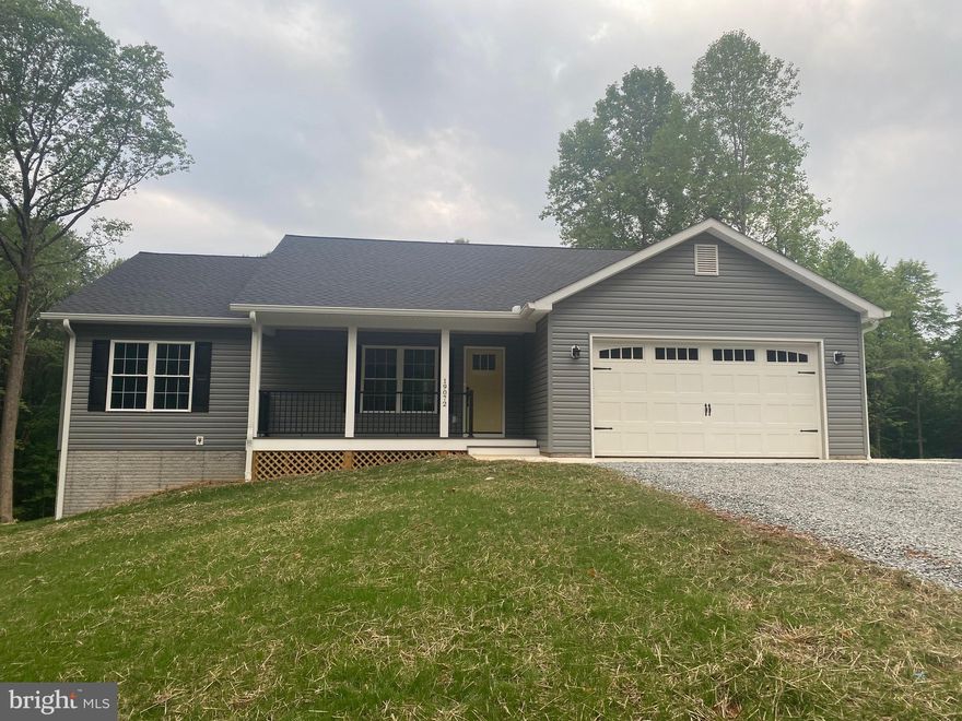 Over 1600 square feet finished, new construction ready IN JULY-  3BR; 2 BA home on 3.35 acres on  
S. Merrimac Rd minutes to Town of Culpeper and Rt. 29. Many upgrades included from granite countertops, stainless appliance, kitchen island, oil rubbed bronze hardware throughout to Luxury Vinyl Plank flooring, custom tile walk in shower in MBR bath w/frameless door. Walkout basement, unfinished with rough in plumbing for future bath with a 4bedroom drain field installed, and huge rec space to enjoy, two car garage, and 16'x12' rear deck. Very pretty wooded lot. Work from home on high speed internet call provider to set up.