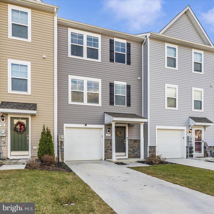 Welcome to this stunning 3-bedroom interior townhome that seamlessly combines luxury and functionality. The main level features gorgeous luxury LVP flooring throughout and an open-concept design, with a gourmet kitchen as the centerpiece. Complete with sleek countertops, stainless steel appliances, and an island perfect for meal prep or entertaining, the kitchen flows effortlessly into the dining and living areas, making it ideal for gatherings. Upstairs, you’ll find three spacious bedrooms, including a luxurious owner’s suite with a private en-suite bathroom, while the additional bedrooms offer versatility for family, guests, or a home office. The fully finished basement provides even more space for entertaining, complete with a full bathroom and endless possibilities for a home theater or game room. Step outside to a deck overlooking the fenced-in backyard, perfect for summer barbecues or relaxing evenings. With modern upgrades and elegant touches throughout, this home is move-in ready and conveniently located near shopping, dining, and commuter routes. Don’t wait—schedule your showing today and experience everything this exceptional home has to offer!