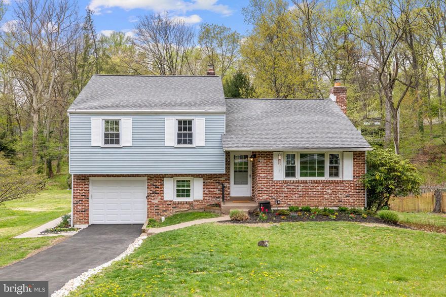 OPEN HOUSE CANCELLED, HOME IS UNDER CONTRACT. Step into luxury and discover the lifestyle you've been dreaming of in this beautifully updated home, nestled in the award-winning TE School District. Thoughtfully designed with both comfort and style in mind, this amazing home is perfect for everyday living and effortless entertaining. As you step inside, you're welcomed by an amazing open concept, featuring a bright, airy living room that flows seamlessly into the dining area and updated kitchen. The updated kitchen features a marble tile backsplash, granite countertops, center island, and stainless steel appliances—ideal for everything from casual meals to gourmet creations. Step outside to your private backyard retreat, complete with a deck overlooking serene wooded views and a peaceful babbling creek—your very own slice of tranquility. A cozy wood-burning fireplace and a conveniently located coat closet round out the main level. Upstairs, you'll find three generously sized bedrooms with ample closet space, a hallway linen closet, and a recently renovated full bath. The lower level offers even more flexible living space, including a finished rec room that can be used as a home office, gym, playroom, or (wo)man cave, plus a spacious laundry area, powder room, and access to the 1-car garage. Need storage? This home also features an additional basement space perfect for stashing all your extras. Located in a quiet Devon Downs neighborhood just a half mile from two train stations and minutes from the Upper Main Line YMCA, Lancaster Ave shops and dining, and several parks. Commuting is a breeze with easy access to Rt 30, Rt 202, 422, and the PA Turnpike. You won't want to miss out on this incredible home!