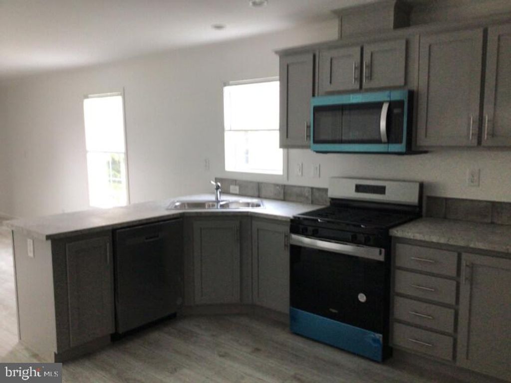 Photo of 62 Harrison Drive, FAIRLESS HILLS, PA 19030 (MLS # PABU2096944)