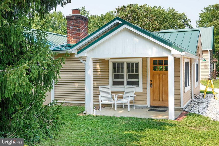 This one level, open layout farmhouse near the entrance to Bay Ridge is on a spacious lot.   Within a compound of buildings, including a converted barn which is owner's residence and garage, parking is plentiful.  *** all utilities, treated water/septic, as well as exterior maintenance, lawn care and gutter cleaning is provided by owner ***.  

House was totally renovated 2021, including  SS appliances, fixtures, maple cabinets, granite counters, baths, trim, floors..  Large wood burning fireplace.  Separate laundry room with side by side washer and dryer.   Half basement contains water treatment and geothermal equipment. Additional unfinished room perfect for storage or fitness!  Certified lead free; pets on case by case basis, non smoking premises.  Immediate  occupancy.  **Tenants must allow front spruce to be illuminated for Christmas holidays; rear barn used for art gallery; weekly showings **