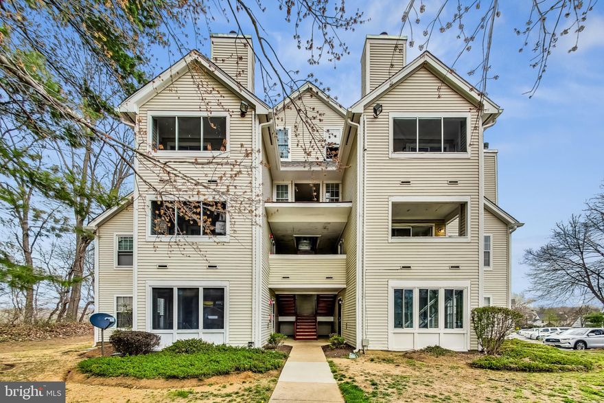 This exquisite second-level condo offers a luxurious living experience with meticulous attention to detail. Boasting two bedrooms and two baths, this residence is adorned with modern amenities and stylish finishes throughout. Upon entry, the brand-new kitchen immediately captivates with its designer white cabinets, elegant Corian countertops, and contemporary fixtures. The entire unit has been freshly painted, creating a bright and welcoming ambiance. Adding to the allure, new luxury vinyl plank flooring spans the main living areas, complemented by new carpeting in the bedrooms. The family room features a vaulted ceiling and a wood-burning fireplace and it leads to a private balcony and the list goes on.