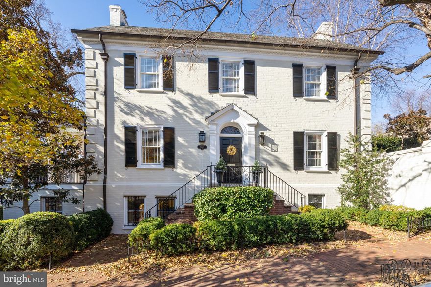 Nestled within Georgetown's East Village, this extraordinary residence stands as a beacon of refined living in the heart of the city. A unique blend of familial warmth and metropolitan convenience, this meticulously restored Colonial home, boasts an unparalleled elegance that permeates its expansive 4,350 square feet. 

Every detail of this fully detached masterpiece has been thoughtfully considered and artfully executed. The modernized eat-in kitchen. features SubZero and Viking appliances and top-of-the-line fixtures. All bathrooms throughout the home have been updated to feature elegant Waterworks fixtures. The lower level is a testament to the comprehensive restoration unfolds as a fully renovated sanctuary, featuring a family room with fireplace, wet bar and powder room, private office and an expansive laundry room with storage plus a utility room. 

Elegance unfolds throughout the residence's gracious four levels, offering ideal spaces for hosting gatherings in the sophisticated principal rooms of the main level complemented by the convenience of the powder room. The home graciously accommodates daily life with four bedrooms and Three full and two half bathrooms, each space meticulously crafted to ensure a sense of comfort and charm Step into the embrace of outdoor tranquility with a generous covered porch off the living room. a private walkout level terrace, a garden accessible from the dining room and Kitchen - a seamless extension of the home's refined interiors. 

This Georgetown gem is crowned with the rare luxury of a gated four-car parking pad, adding an exclusive layer of convenience to this exceptional property. In every aspect, this residence stands as a testament to the fine balance between historic charm and contemporary allure in the heart of Georgetown's most coveted enclave.