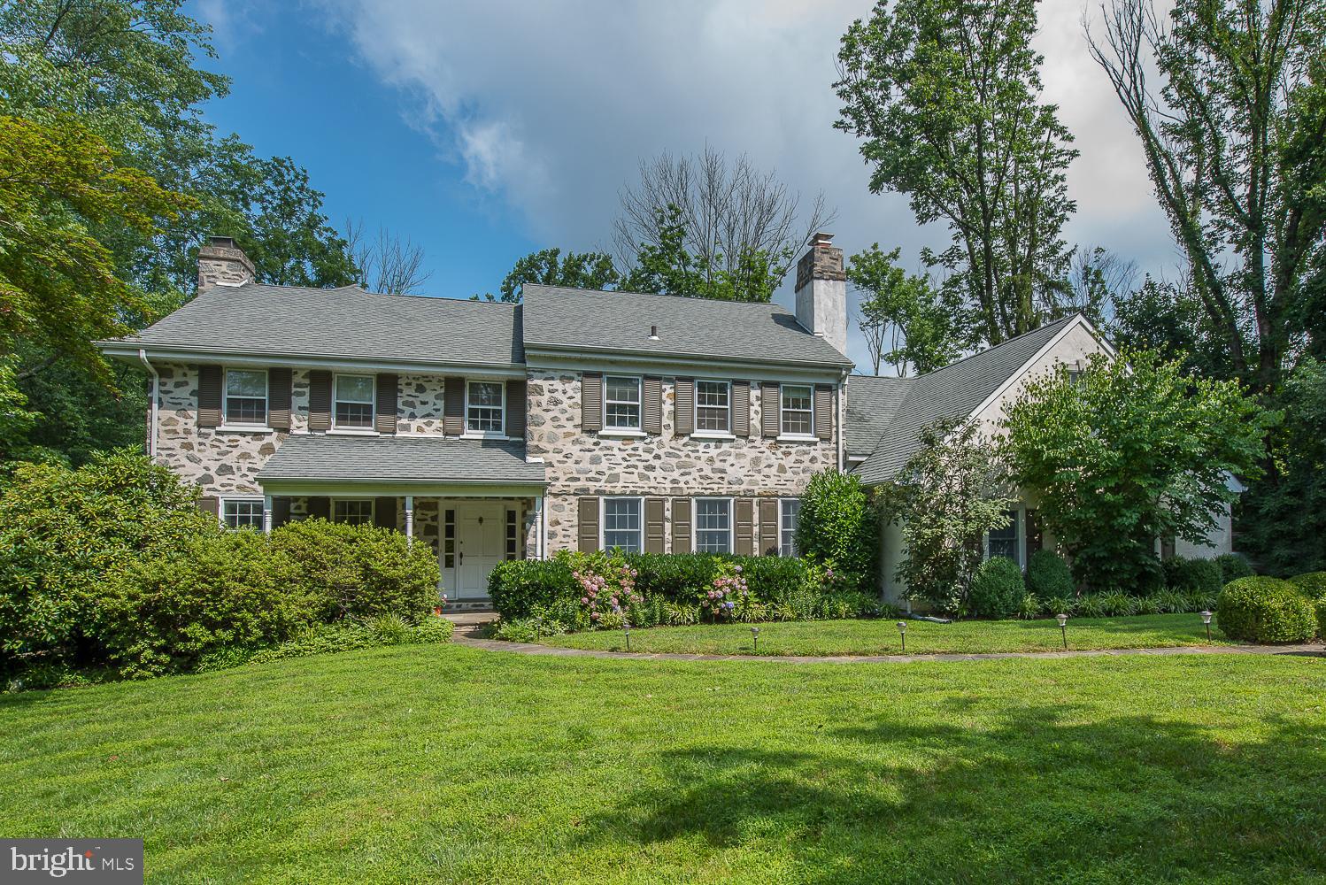This Main Line home is situated in a private cul-de-sac on the north side of Villanova! This expanded 5300+ SF home has everything you need under one roof! Adjacent from the center hall foyer are the formal living room with large fireplace and 4 large windows bringing natural light and formal dining room with 2nd fireplace for holiday dinners and special occasions with a wet bar for perfect entertaining. Living room offers French doors that open to a den or office space overlooking the manicured grounds and in ground pool. Gourmet kitchen with top of the line stainless steel appliances, custom back splash and access to spacious deck. Great room with cathedral ceiling surrounded by floor to ceiling windows and 3rd fireplace complete the main rooms on this level. Main level laundry, powder room, big mudroom and entry to 3 car garage 2nd level offers extensive Master suite featuring with his/her walk in closets, his/her vanities, whirlpool tub and custom shower. 4 additional family sized bedrooms and 2 full baths on this level with access to steps up to full attic area. Walk out Lower level offers tremendous space beautiful stone fireplace center of attention for 2nd family room or recreation area, 2nd laundry, full bath, home gym/bonus room that can be utilized as the 6 bedroom for an in law or au pair suite. Easy access to lower patio and exterior backyard to enjoy over an acre of privacy and pool fun! Award Winning Lower Merion Schools and minutes to Bryn Mawr train station, 76, 476, Main Line shopping and restaurants. Short drive to Center City Phila, 30th St. Station and PHL Airport.