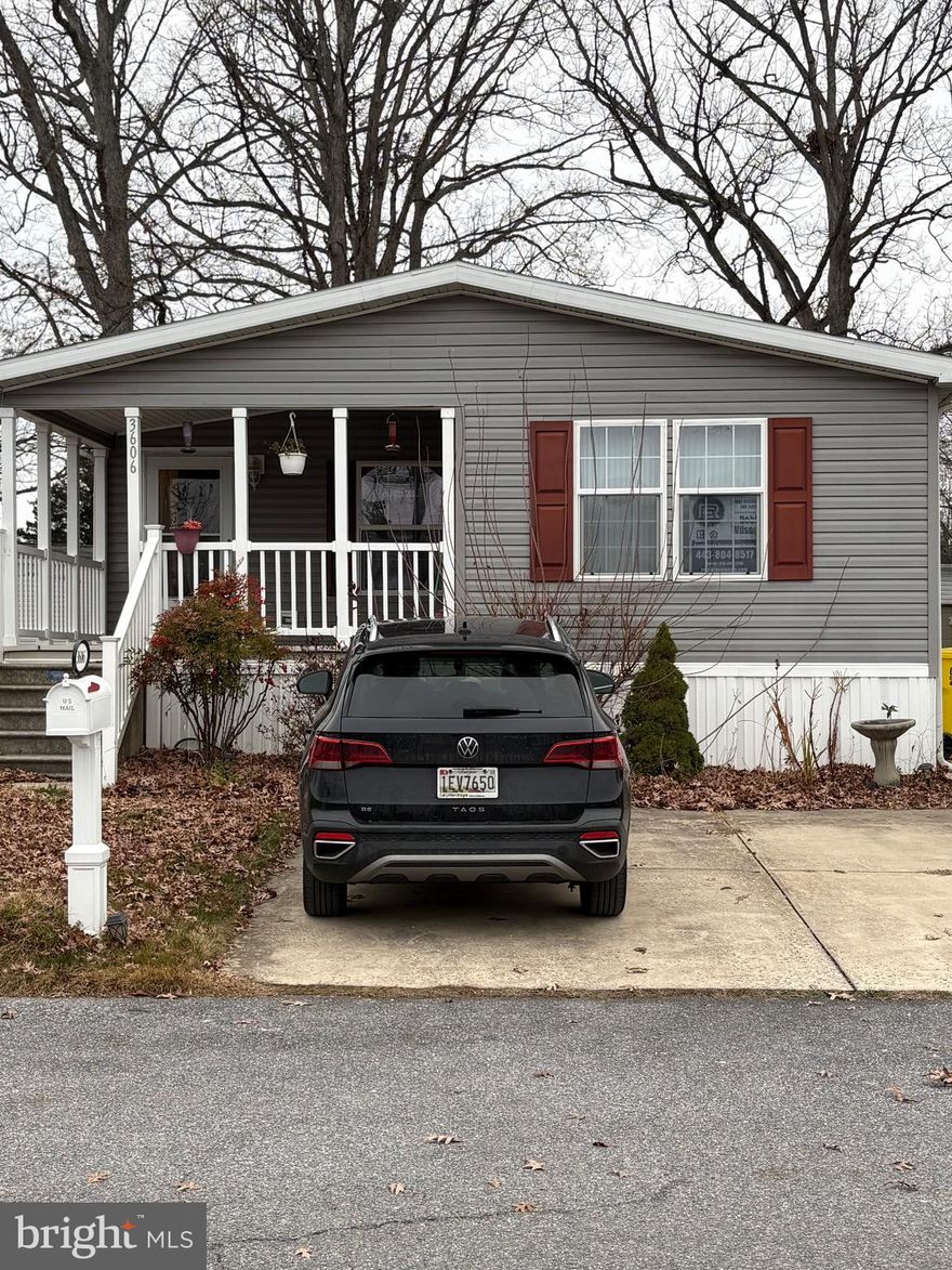 Welcome home to this well-maintained 3-bedroom, 2-bathroom double-wide manufactured home, located in the highly desirable Williams Estates/Peppermint Woods community.  
Step inside to an inviting open-concept layout offering an effortless flow between the living, dining and kitchen areas. Enjoy the bonus room off of the kitchen that features a patio door leading to the covered deck—perfect for everyday living and entertaining. 
The kitchen features attractive vinyl flooring for both style and durability. 
The spacious primary bedroom includes its own private bathroom, equipped with an ADA-accessible tub for enhanced comfort and convenience. 
Additional conveniences include central A/C, in-unit washer & dryer, and 10' x 8' shed equipped with electricity and a built-in work bench.
Your driveway will provide parking for two vehicles, in addition to on-street parking available.
Pets allowed -need to contact park office to confirm details on permission for specific pets.
Perfectly situated near shopping centers, restaurants, public waterfront parks and beaches, marinas and nearby Rocky Point Golf Course. This home places you close to everything the area has to offer. 
Minutes away from public transportation, commuter routes, MARC train station and Martin State Airport.
Buyers Note:
 1. Prospective Buyers must apply with Williams Estates & Peppermint Woods to qualify for the park leased lot.  Contact park office  at 855-573-1113 or 410-686-0077.
2. Financing: A separate loan application to purchase the manufactured home must be completed with a lender that finances mobile/manufactured homes. 
Suggested lenders include 21st Mortgage, Park Lane Financing Solutions, APGFCU, Hartford Bank, and Mainland Financial. 
Not eligible for traditional FHA/Conventional loans. 
All measurements are approximate and should be verified by Buyers.
Current lot lease $1133/month, trash collection $30.96/month and water/sewer monthly fee charged according to  usage. Call office to verify.
HOME IS NOT FOR RENT