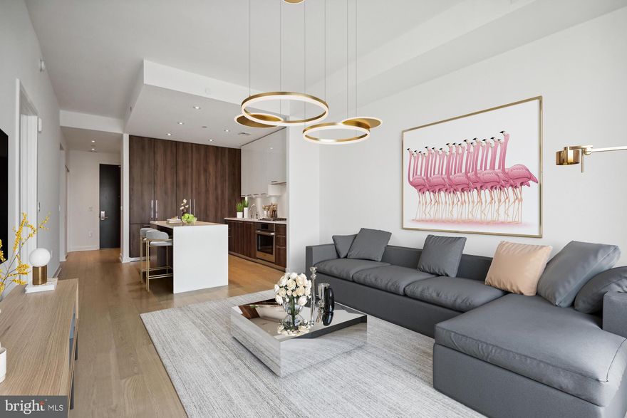 SPOTLESS 1 bedroom + DEN, 1.5 bathroom 800+ sqft condo in the Verse! Experience luxury living in the heart of Tysons Corner, steps away from the silver line metro, grocery shopping, top level restaurants, and high end shopping! This 16th floor residence offers beautiful sweeping views with ample amounts of natural light flooding the unit throughout the day. The kitchen features custom cabinetry stretching to the top of the 10-foot ceilings with built-in microwave, fridge and freezer, a gas range, and seating at the waterfall edged island.  Work from home with ease at your spacious den with a half bath across the hall. Your spacious bedroom offers a walk-in closet, and a full bath with marble floors and built-in cabinetry. Conveniently there is bike storage near your parking spot in the garage as well. Amenities are endless from the 9th floor skydeck, to the 14th floor pool overlooking all of Tysons Corner and beyond, gym and wellness center, outdoor kitchen and common room for entertaining guests, a yoga studio, and more. The Boro offers a Whole Foods, cinema, and many different shops and restaurants. Tysons Galleria is a 10-minute walk away, containing world class shops and brands known to all. Unit 1603 at The Verse is easily accessible to the Dulles Toll Road, Route 7, both regional airports, and the entireity of the Washington DC region.  
Available May 17 2024 for move in.