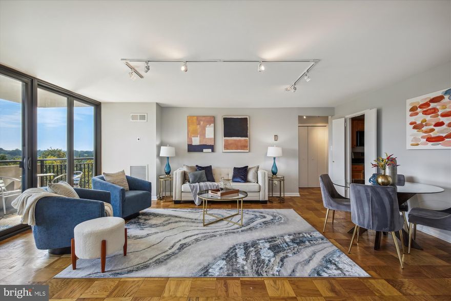 Wow! What a view! What an amazing home! Your eyes will pop when you open the front door and see an unobstructed, southwestern view through floor to ceiling glass doors that lead to a lovely private balcony. Embrace the convenience of living at this beautifully updated building in the center of bustling Friendship Heights/Chevy Chase. A gracious, wide entry hall with closet leads to the spacious kitchen with abundant cabinets, counter space and kitchen storage. Natural light streams through the floor to ceiling windows in the living room and both bedrooms. The open floorplan creates an easy flow from the dining room to the living room. Two bedrooms and one and one half baths allow for plenty of private space and the full size in-unit stacking washer/dryer makes daily chores a breeze. This unit conveys with one garage parking space and a storage unit. All utilities are included in the condo fee. This is a fantastic location, just a few minutes walk to Metro, Capital Crescent Trail, Whole Foods, Amazon Fresh, fine shops and restaurants in wonderful Friendship Heights and Chevy Chase, a great neighborhood with the best benefits of urban life. Recently renovated luxury building with gorgeous grand lobby, hallways, magnificent entrance and driveway. Smoke-free building boasts fabulous amenities including a free shuttle bus to Metro. 24-hour front desk, onsite management, library, heated swimming pool, sauna, fitness center and party room.