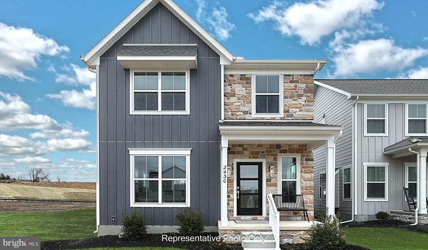 UNDER CONSTRUCTION – AVAILABLE THIS SUMMER: This charming 2-story home includes a 1-car, rear load garage with mudroom entry, and a covered porch for outdoor living. The first floor boasts 9’ ceilings and vinyl plank flooring throughout the main living areas. The kitchen, featuring stainless steel appliances, attractive cabinetry, and quartz countertops with a tile backsplash, opens to the spacious dining area and sunny living room warmed by a gas fireplace with floor to ceiling stone. The 2nd floor boasts an owner’s suite with an expansive closet and private bathroom, 2 additional bedrooms, a second full bathroom, and a convenient laundry room.