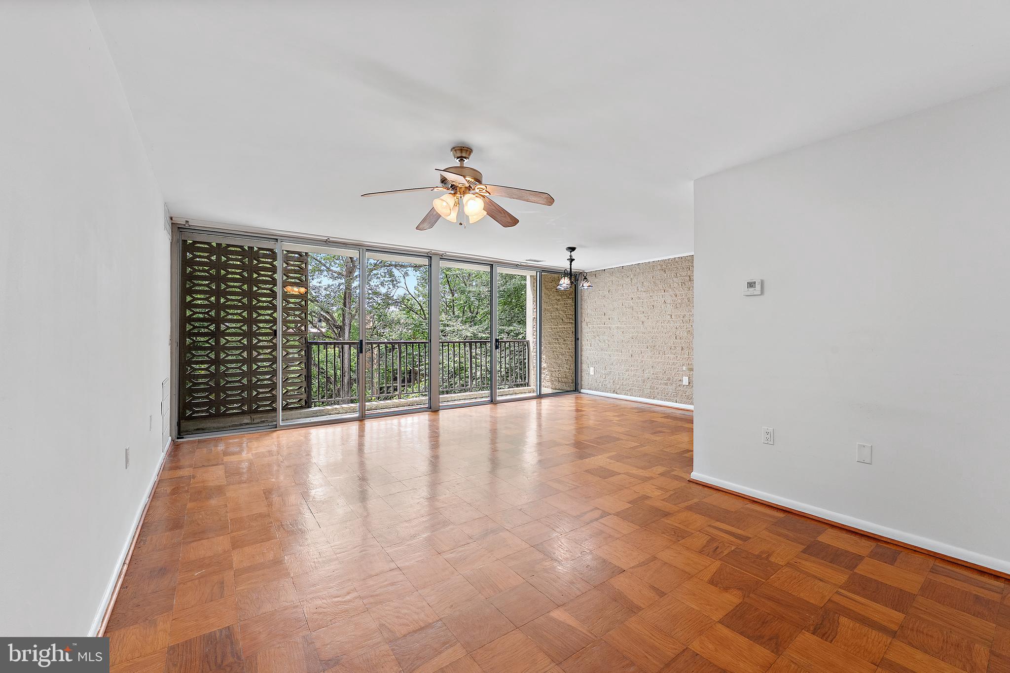 Bright and spacious 2BD/1BA condo located in the heart of Annandale’s Briarwood Court. This well-maintained home offers 938 sq ft of comfortable living, featuring an open-concept living and dining area with wood floors and floor-to-ceiling sliding glass doors that lead to a full-length balcony with tranquil views of mature trees. Both bedrooms enjoy excellent natural light, peaceful treetop views, and generous storage, including walk-in closets in the hallway and primary bedroom. The common laundry room is conveniently located just two doors away. The location offers unmatched convenience with quick access to I-495 and Little River Turnpike. Just minutes to the Mosaic District, NOVA Annandale campus, Route 50, and a variety of shopping and dining options, including H-Mart, Breeze Cafe, and Heritage Shopping Center. Tenant is responsible for electric, cable/internet, and annual HVAC inspection/report per condo association guidelines. Enjoy the perfect blend of privacy and convenience with unbeatable access to everything Annandale has to offer.