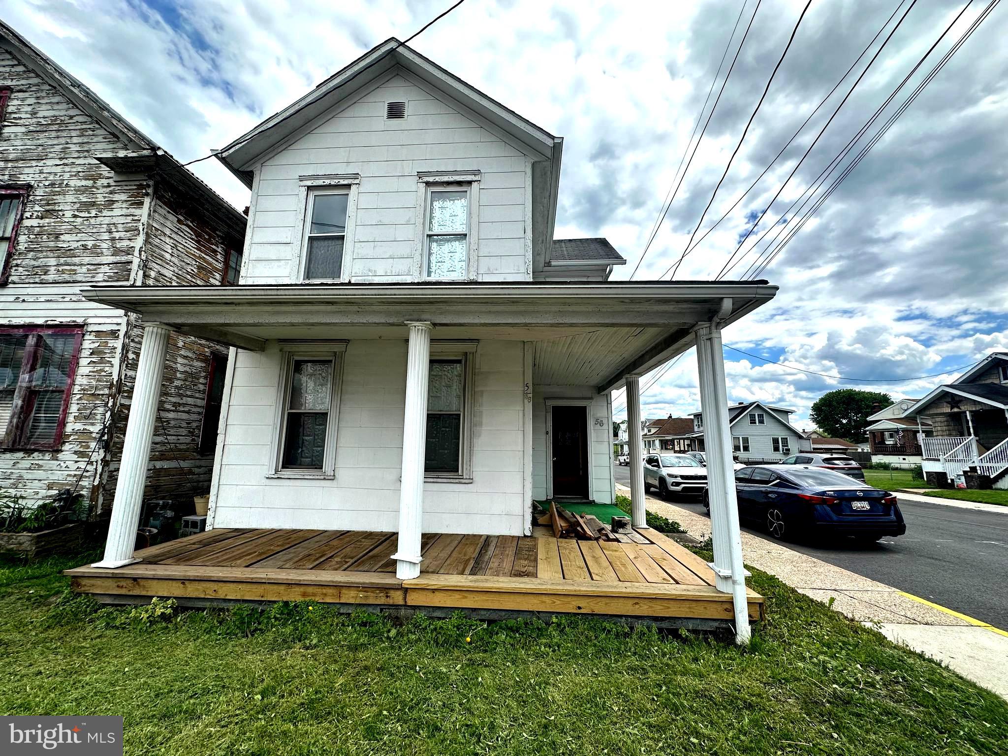 Looking for your next project?? This 3-bedroom 2 bath home is bursting with potential and ready for a fresh start. With solid bones, a spacious layout and tons of character, this property is perfect for investors, flippers or anyone ready to roll up their sleeves and bring a vision to life.
Situated on a corner lot, near the C&O bike trail and minutes from downtown Cumberland, MD this home offers a rare chance to use your ideas and imagination.
It has a detached garage with durable metal roof and solar panels and a small fenced in yard.