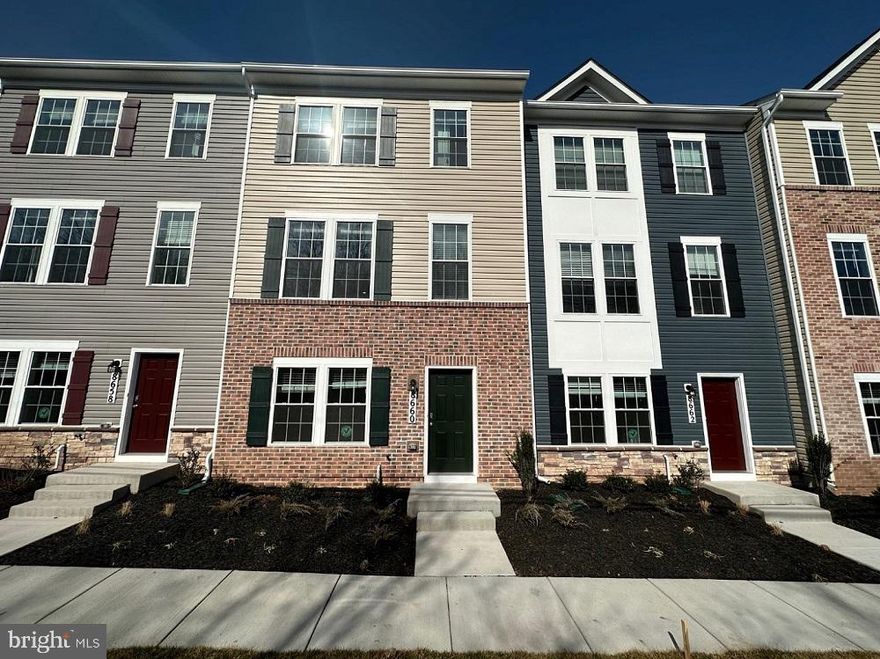 DECEMBER CLOSING!    Welcome to the Adams townhome by the nation’s #1 Homebuilder-D.R. Horton includes 4 bedrooms, 3.5 bathrooms and a 2 car garage.  Enter the Adams where you will find a flex room to use as you choose- a rec room, home office or 4th bedroom along with a full bathroom! Soaring 9 ft ceilings on the main level enhance this ever so popular open floor plan concept! Enjoy entertaining as all gather around this over-sized kitchen island.  The kitchen features crisp white cabinets along with granite counters.  Kitchen appliances are by Whirlpool -stainless steel Range, side-by-side refrigerator, microwave and dishwasher.  Easy to maintain luxury plank floors are throughout the main living area, all baths and foyer. Continue to the bedroom level where you will find the primary bedroom with generous closet space as well two secondary rooms, upper level laundry and hall bath.  Bedrooms include an LED light which is compatible with future ceiling fans.  All baths include granite counters.  Stay connected while away from your home with our home is connected package.  For your convenience window blinds are included.  This includes a camera at the front door, Z Wave thermostat, Deako light switches, and QPanel. Garage door openers are included and wi-fi enabled.  Community amenities include a tot lot along with beautiful walking paths with stunning mountain views! In addition to the ease of major commuting routes, Frederick has an array of activities to suit your lifestyle.  Whether you're interested in outdoor activities, league sports, brewery or winery hopping, nearby retail and incredible dining options, Frederick offers a variety of ways for you to enjoy your new house and make it HOME!  Call for details regarding interest rate specials and closing assistance.  D.R. Horton includes a 10-year warranty.  Additional homes are available.  Please call for details.  We look forward to welcoming you to the D.R. Horton Family!