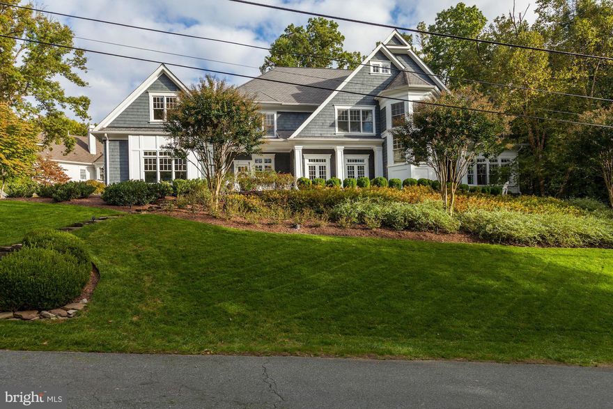 Fabulous home on half acre just outside the beltway.  All 5 beds up en suite, with a huge master suite including gas fireplace and enormous walk in closets  Main level, walk out to magnificent pool/spa, features a large eat in kitchen, family room with coffered ceiling, mudroom with half bath and built ins, living and dining room and office.  LL with media room, kid game/play rm