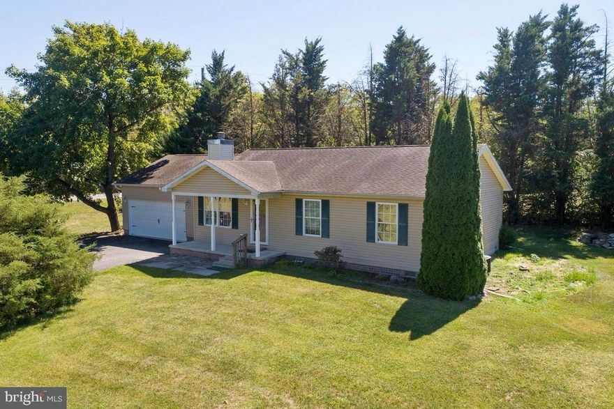 Welcome home!  This adorable rancher sits on just over an acre and only a mile from Spring Mills schools, restaurants, shopping and so much more!  3 bedrooms and two full baths, huge utility/laundry room, hardwood floors, and stainless steal appliances in the kitchen.  Private flat lot surrounded by trees with deck and patio, plenty of room for entertaining!